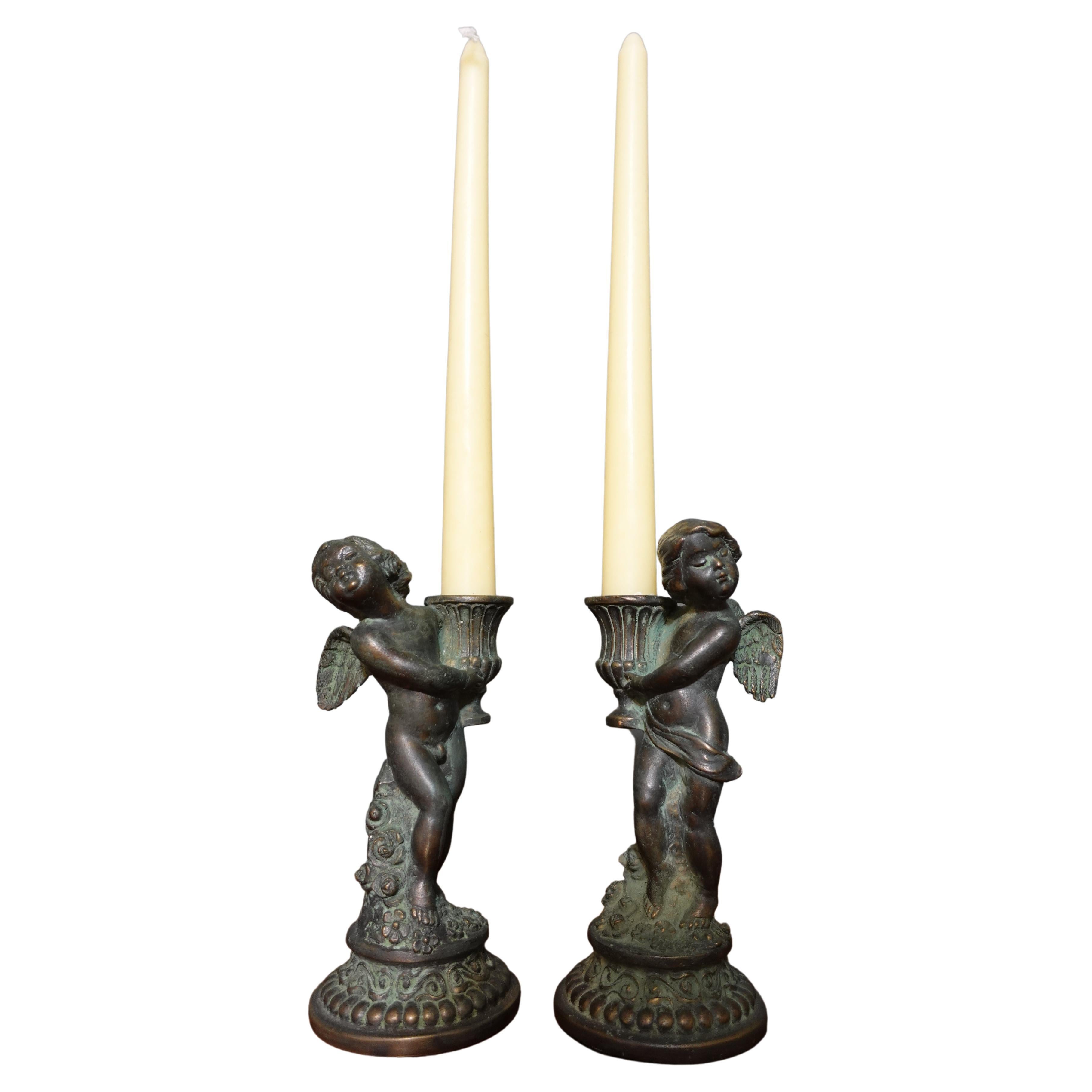 Pair French Louis XV Style Bronze Candlesticks, Modelled as Cherubs with Baskets For Sale