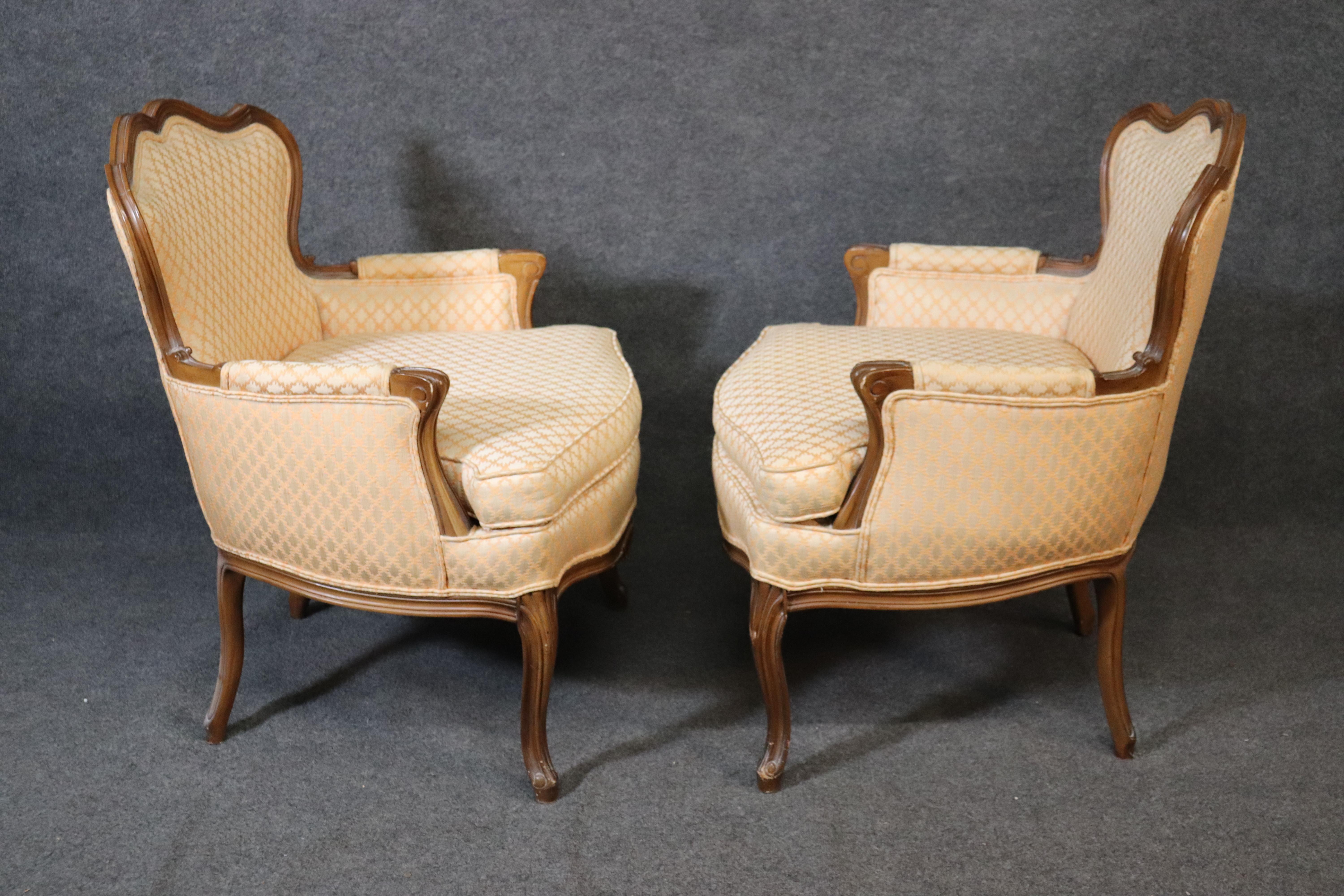This is a beautiful paid of vintage 1950s American made French bergère chairs in good condition. The measures: 36 tall x 27 wide x 28 deep x seat height 20 inches.