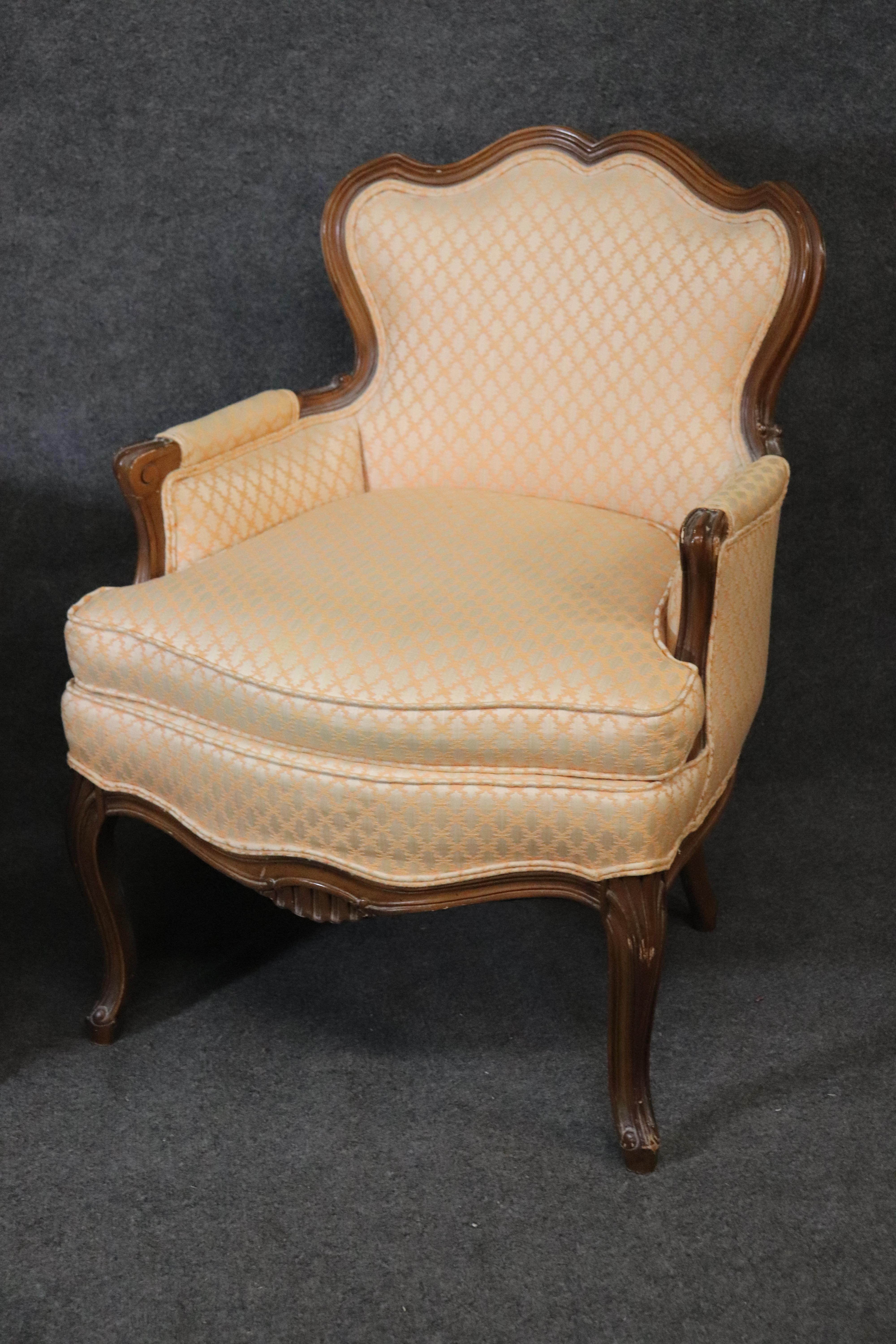 American Pair of French Louis XV Style Carved Walnut Bergère Club Chairs, circa 1950