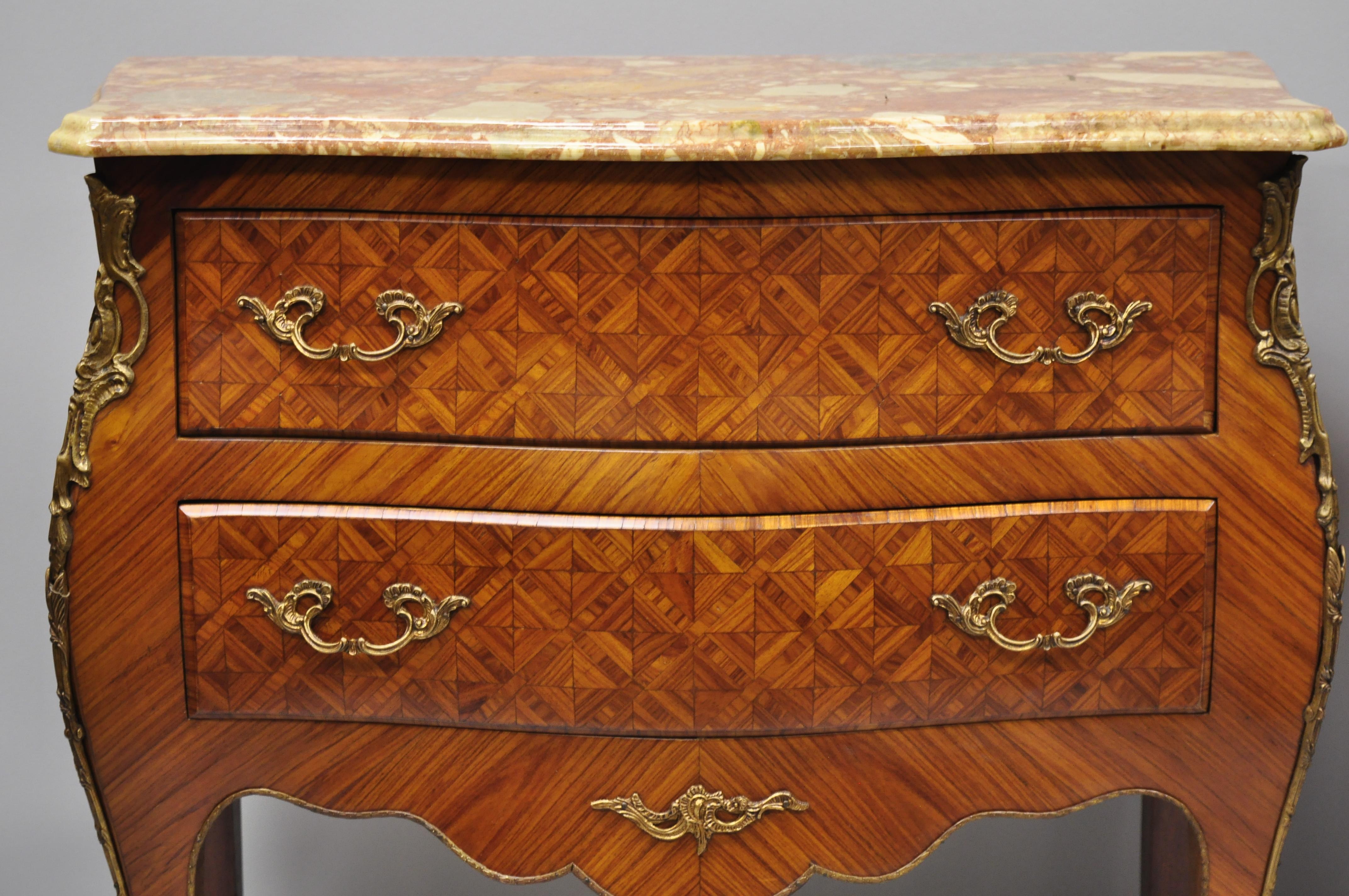 Pair of French Louis XV Style Pink Marble-Top Inlaid Bombe Commode Chests In Good Condition In Philadelphia, PA