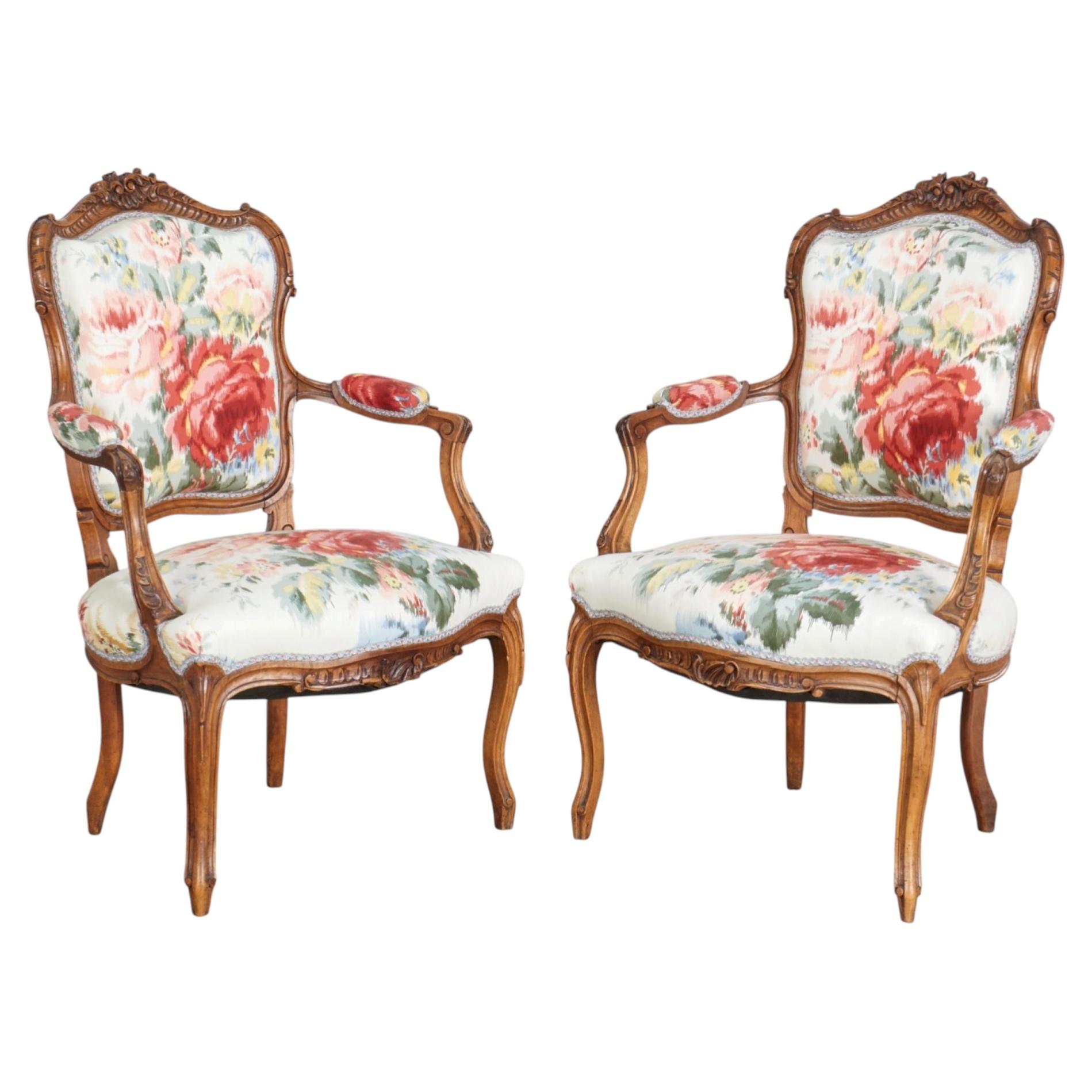 Pair French Louis XV Style Walnut Armchairs with Bold Floral Upholstery