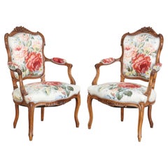 Pair French Louis XV Style Walnut Armchairs with Bold Floral Upholstery