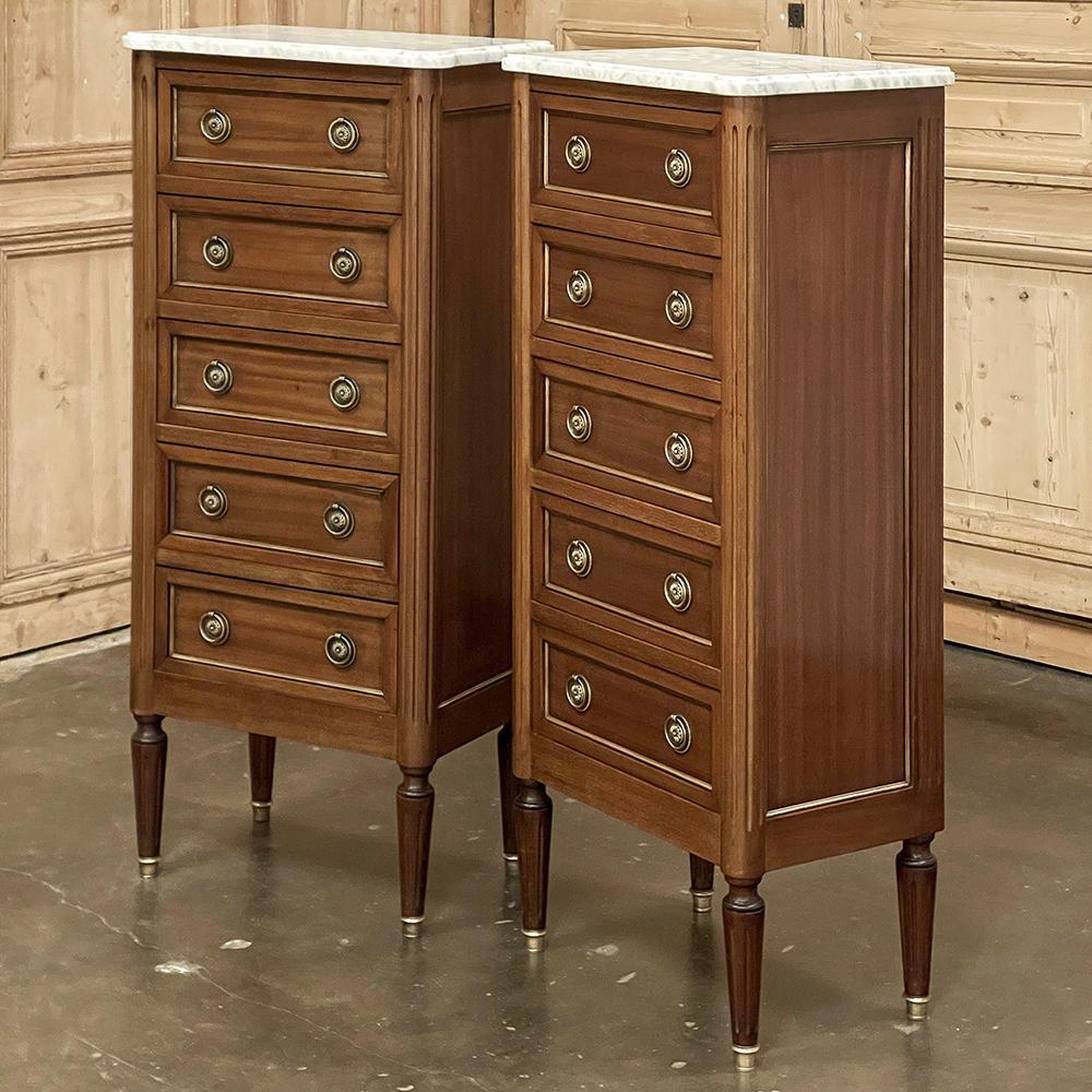 Pair French Louis XVI Chiffonieres ~ Nightstands with Carrara Marble Tops are excellent choices to provide stylish storage in small footprints in a symmetrical duo!  Each is crafted from exotic imported mahogany, and topped with beveled Carrara