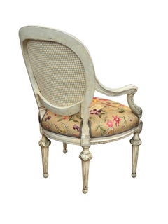 Pair French Louis XVI Ivory Painted Oval Back Arm Chairs with Celadon Highlights
