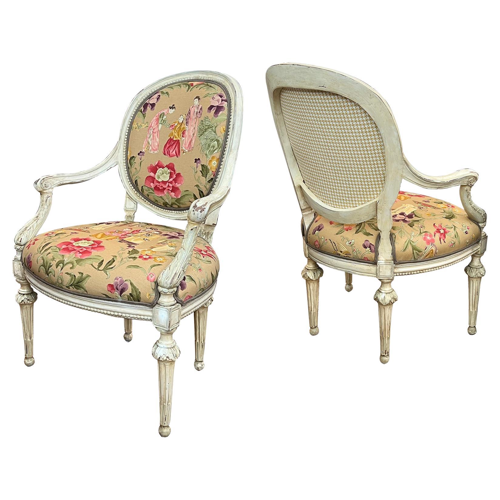 Pair French Louis XVI Ivory Painted Oval Back Arm Chairs with Celadon Highlights For Sale