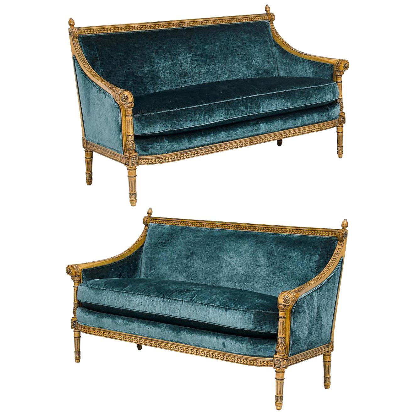 Pair of Louis XVI Style Carved and Laqué Gilded Bergère Settees or Loveseats