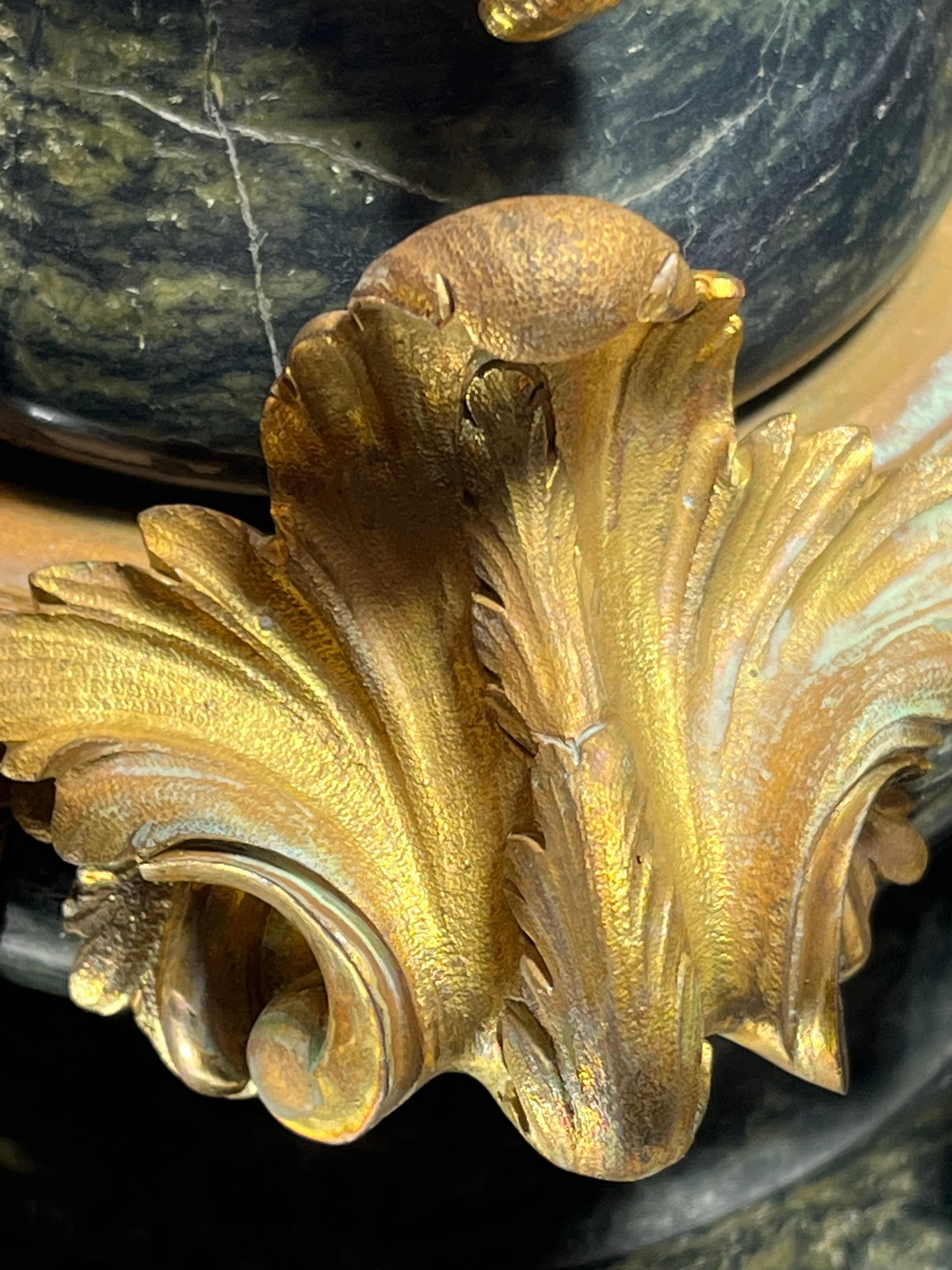 XIX secolo Pair French Louis XVI Style Ormolu Mounted Green Marble Lidded Urns in vendita