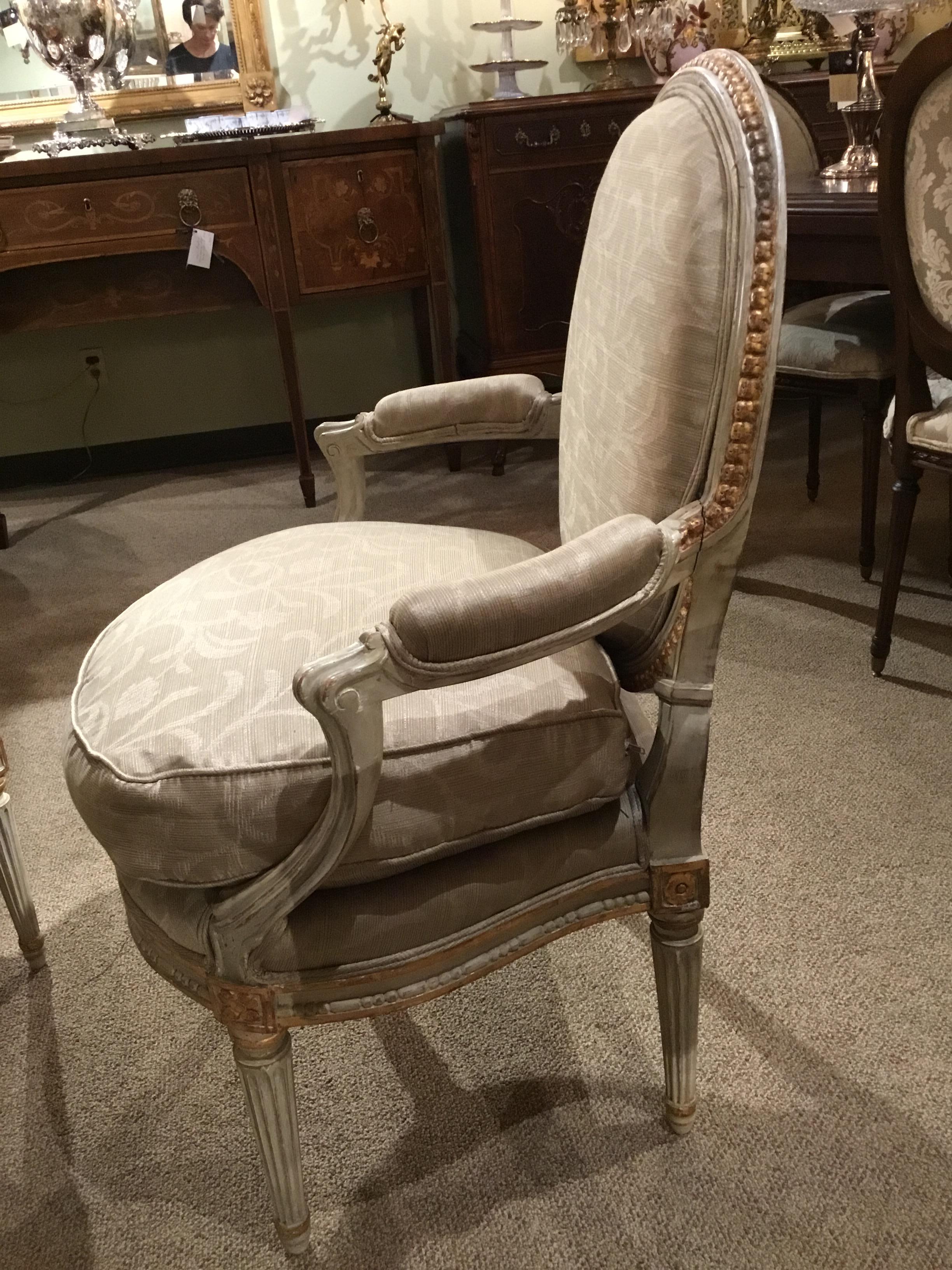 Pair of French Louis XVI Style Parcel Paint and Parcel-Gilt Chairs/Fauteuils In Excellent Condition For Sale In Houston, TX
