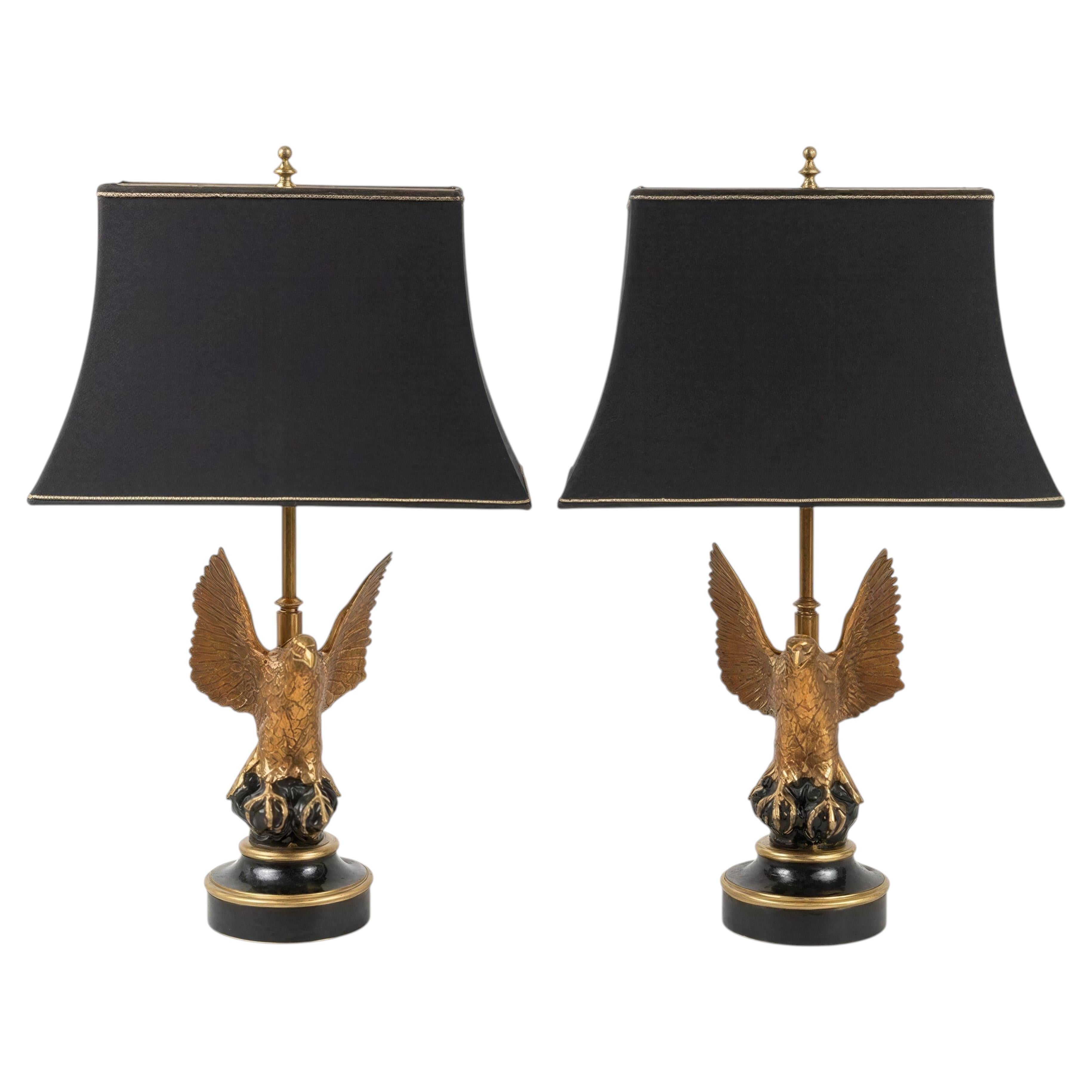 Pair French Maison Jansen black/gold eagle table lamps with black silk shades For Sale