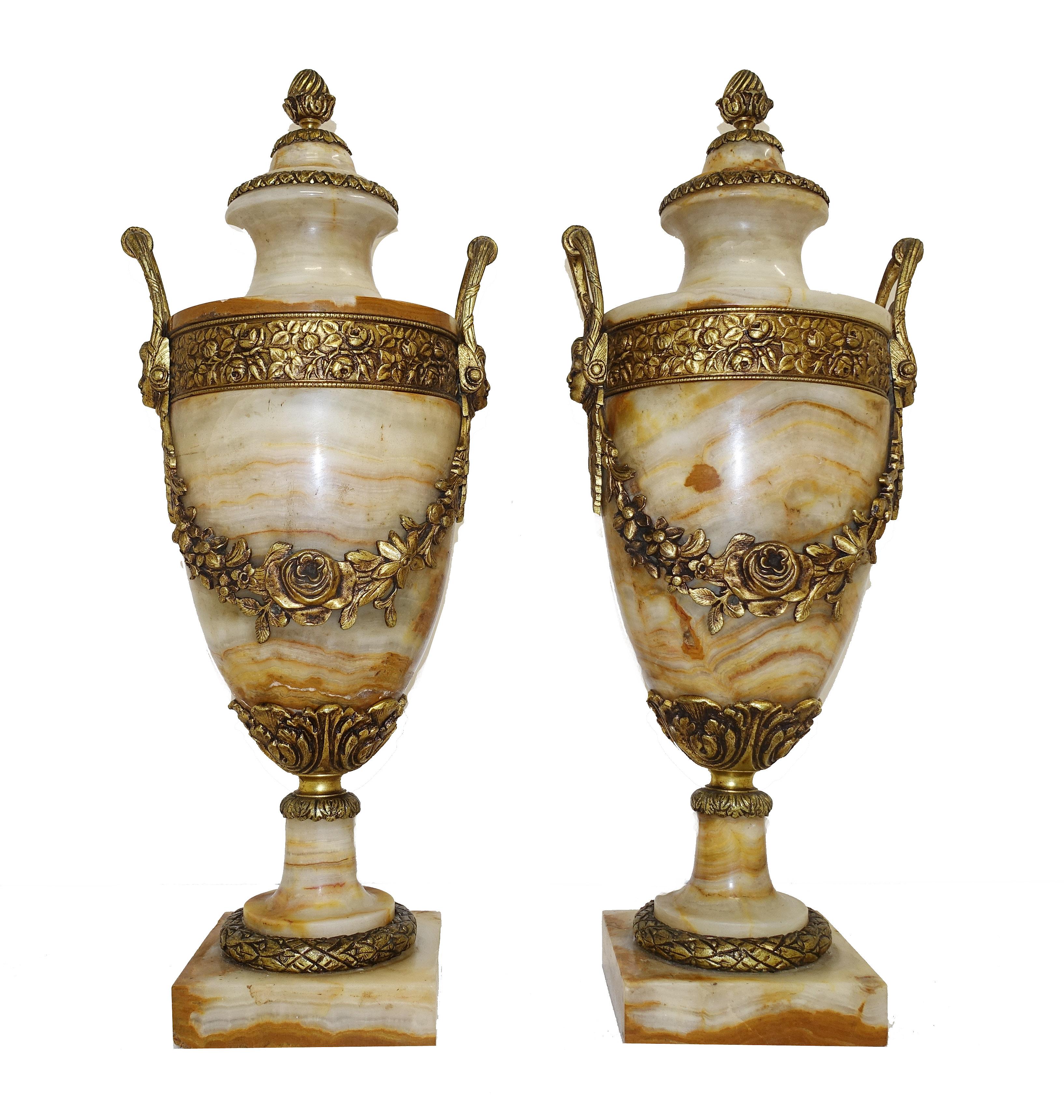Elegant pair of French antique cassolettes or marble urns
Love the colour and tone of the marble in cream with flecks of burnt orange and sand colours
Great pair of classical amphora form, highly decorative and collectable
Features original ormolu