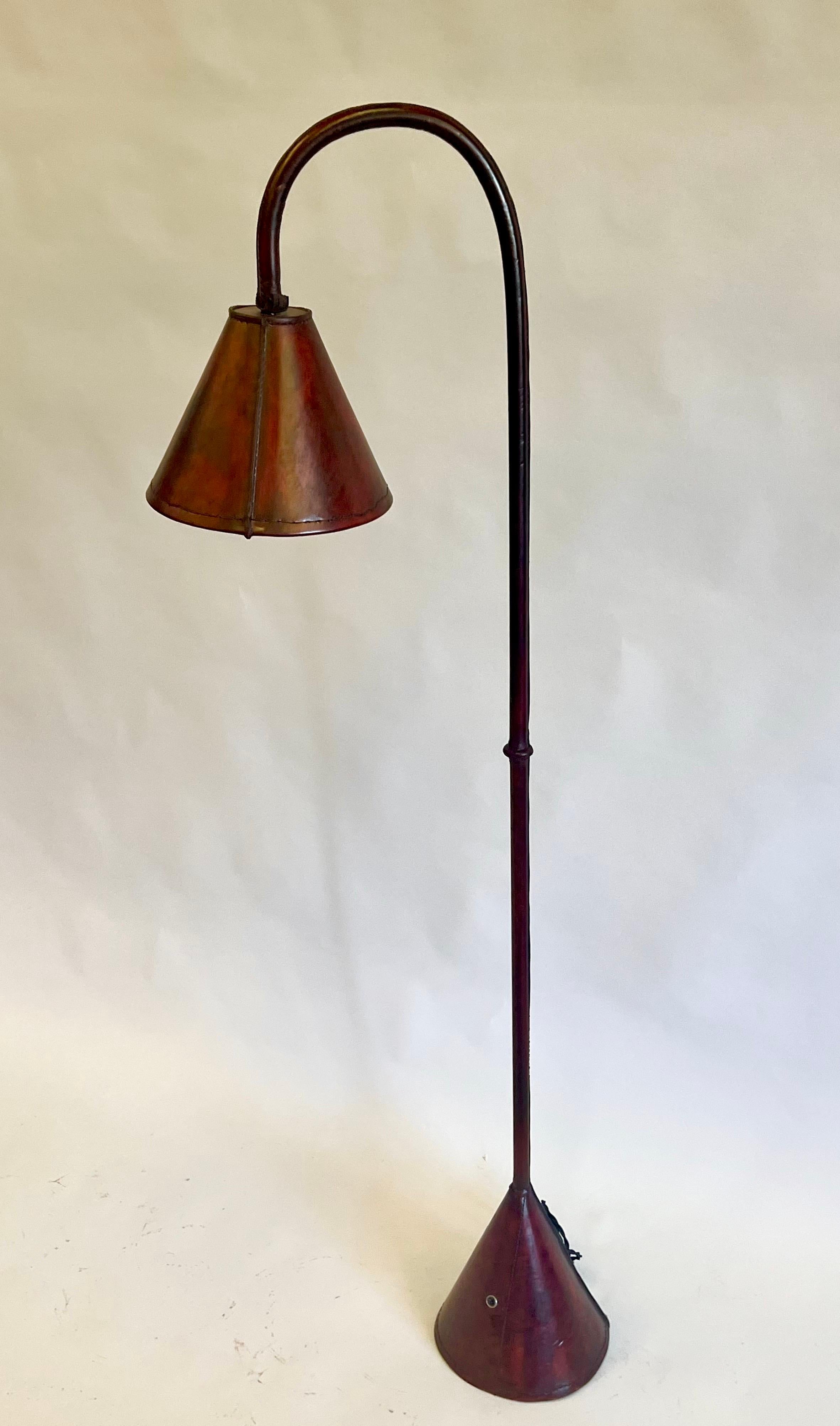 Pair, French Mid-Century Burgundy Stitched Leather Floor Lamps by Jacques Adnet 1