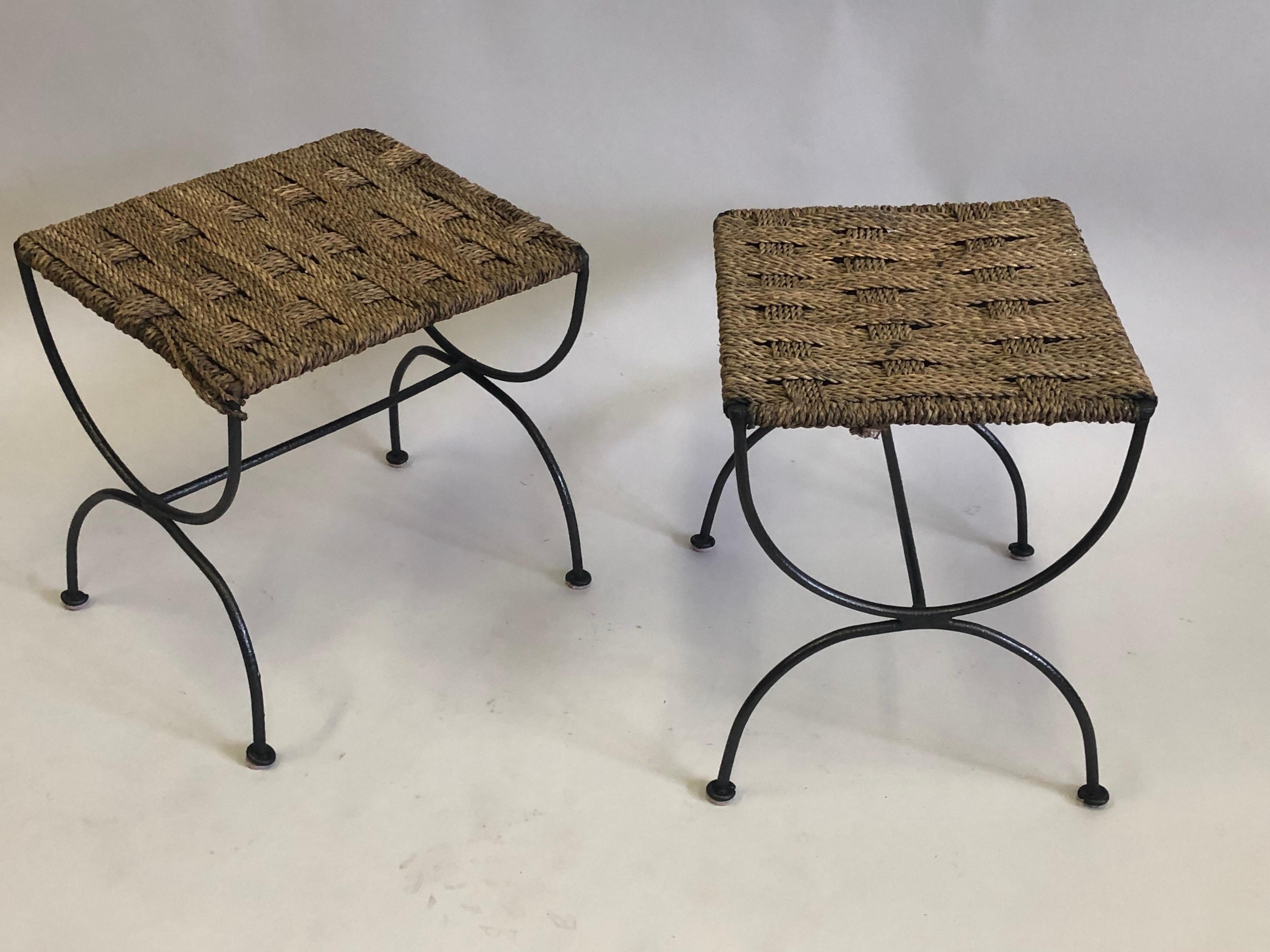 2 Rare pairs of French Mid-Century Modern Neoclassical style stools or benches in hand wrought iron with handmade rope seats circa 1937-1940, attributed to Adrien Audoux and Frida Minet. The wrought iron form is pure and the materials possess warmth