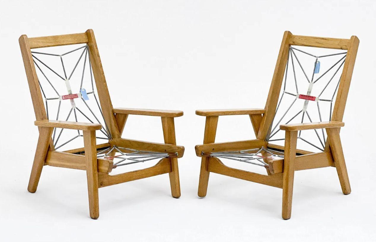 Paire de fauteuils de salon/fauteuils français Pierre Guariche de style mi-siècle moderne, exportés de France en vente 3