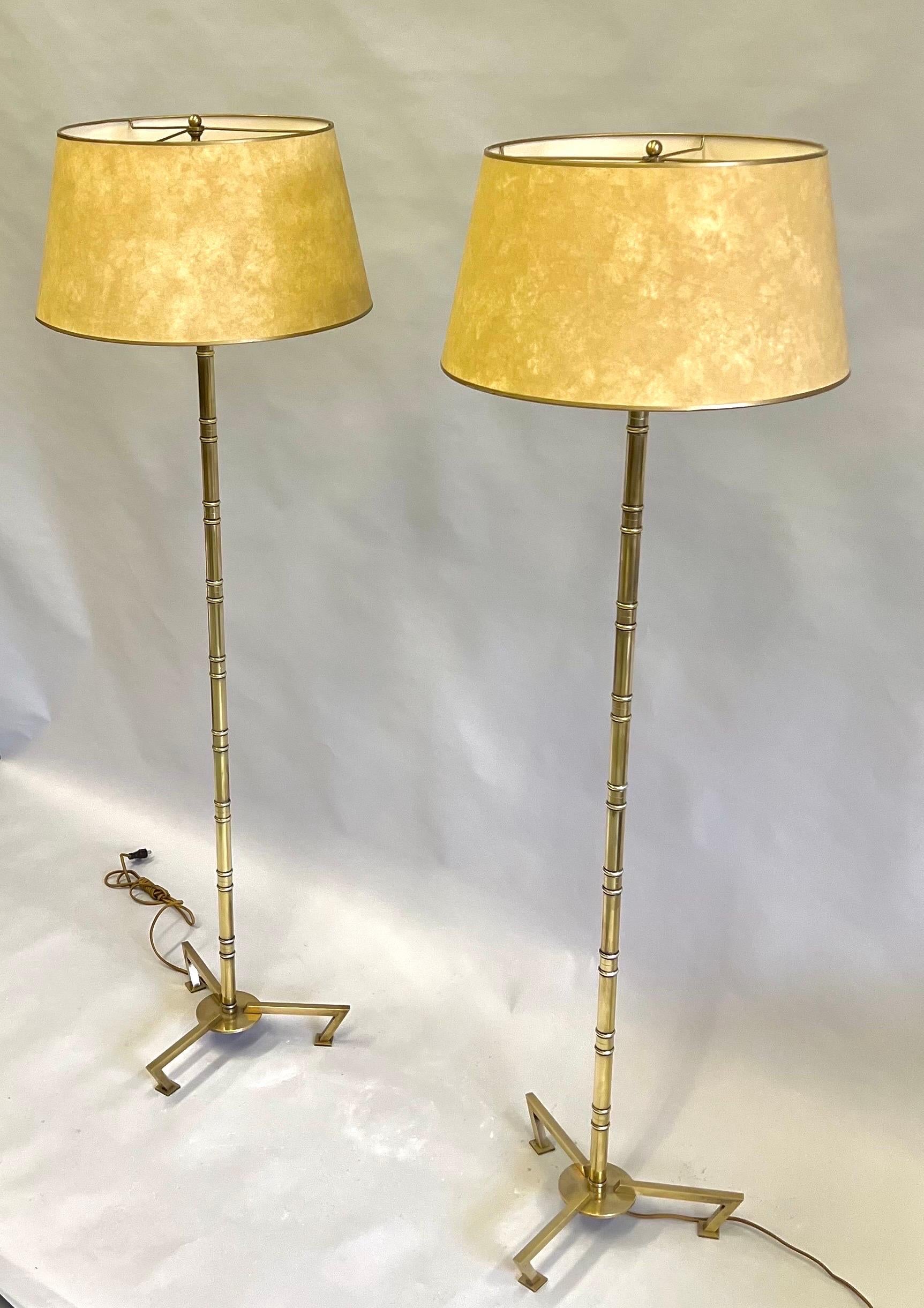 Patinated Pair, French Modern Neoclassical Brass Faux Bamboo Floor Lamps by Maison Bagues For Sale