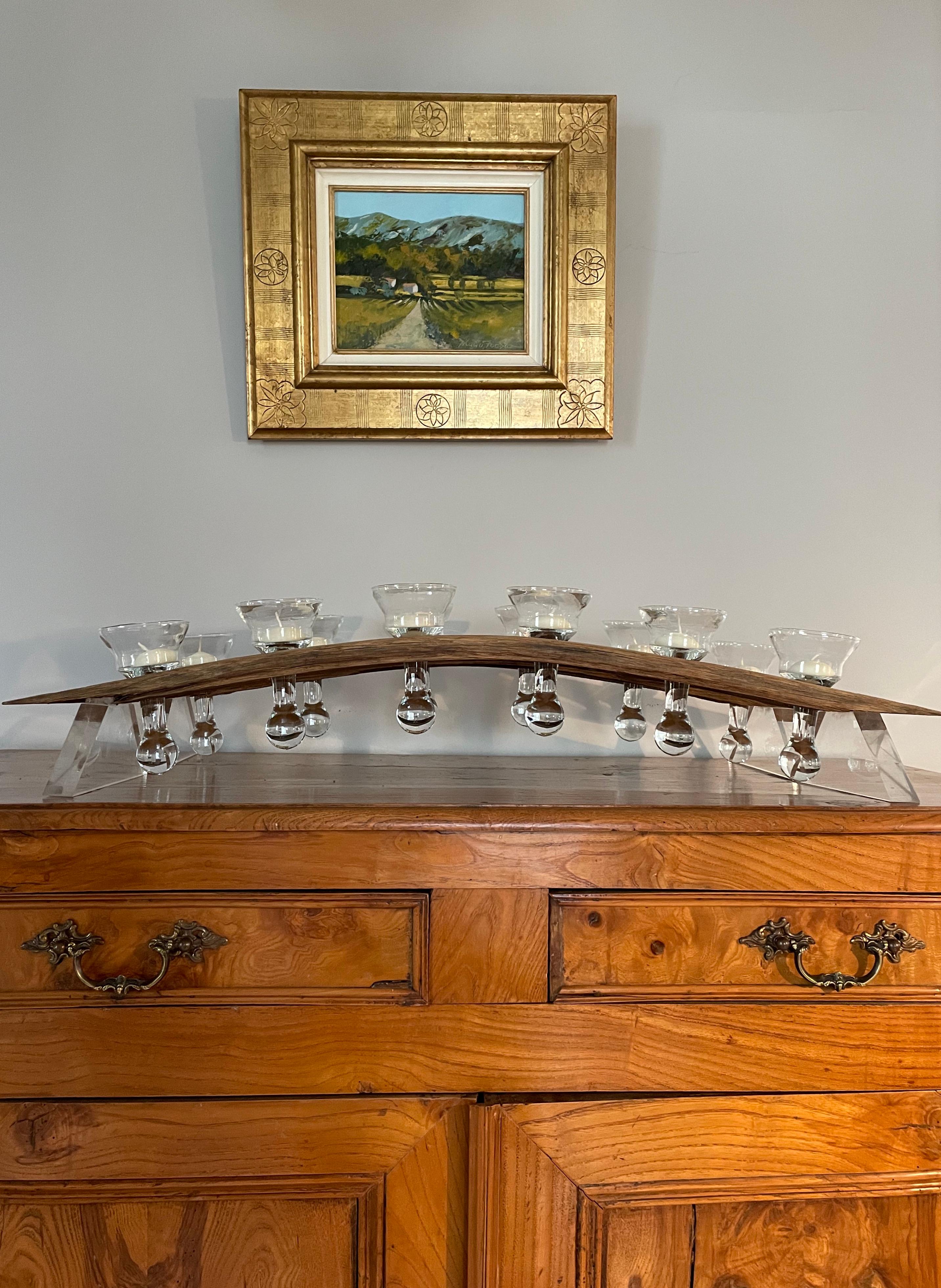 Occasionally we find wild and wonderful things on our buying trips and these are particularly enticing. Made from oak barrel staves and integral plexiglas stands on either end, each candelabrum features 6 weighted and stemmed drinking glasses that