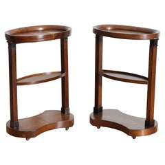 Coppia di tavolini ovali a un piano in mogano neoclassico francese ed ebanizzato, 1°q XIX sec.
