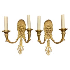 Coppia di appliques neoclassiche francesi in bronzo dorato, XIX secolo