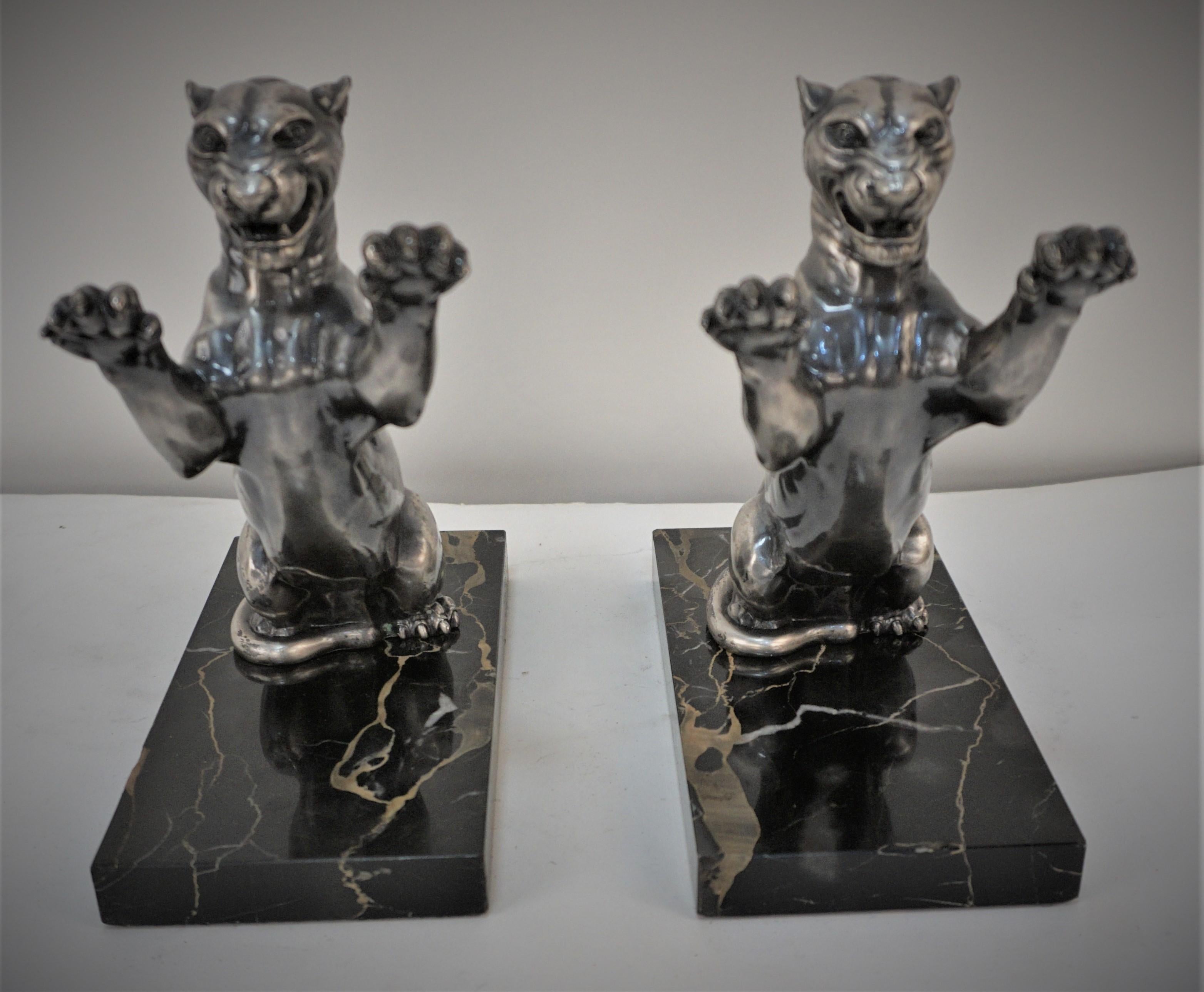 French 1930's silver plate tiger on marble bookends by Parrina Paris.
Measurement is only for one bookend.