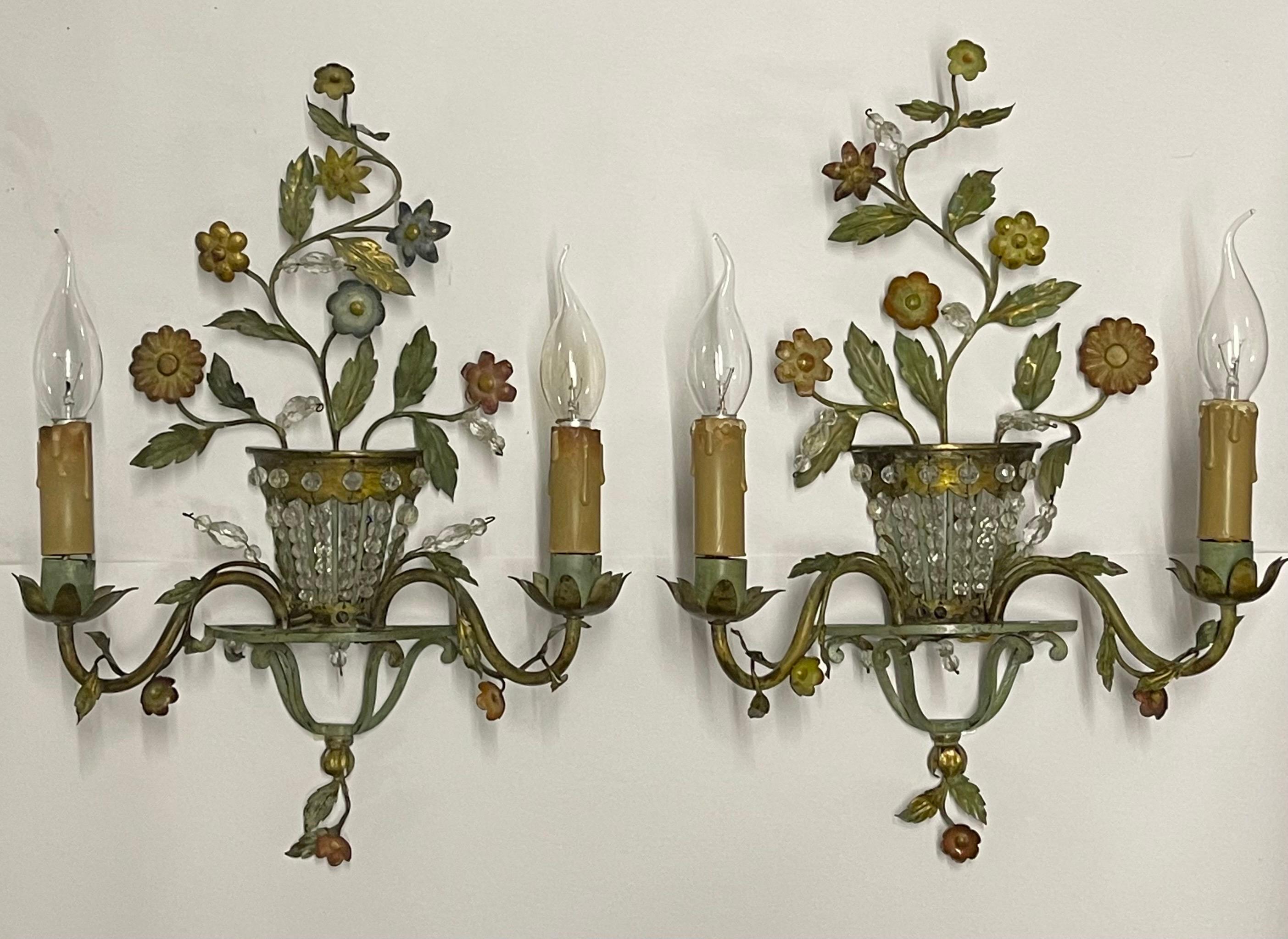 A beautiful pair of French patinated bronze wall sconces with crystal, leaves and flowers, circa 1920s.

Socket: each two x E14 for standard screw bulbs.



