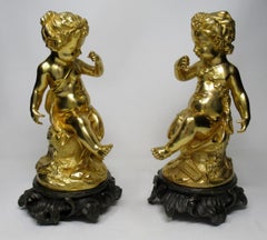 Pair of French Ormolu Patinated Bronze Seated Cherubs Rococo Putto, 19th Century