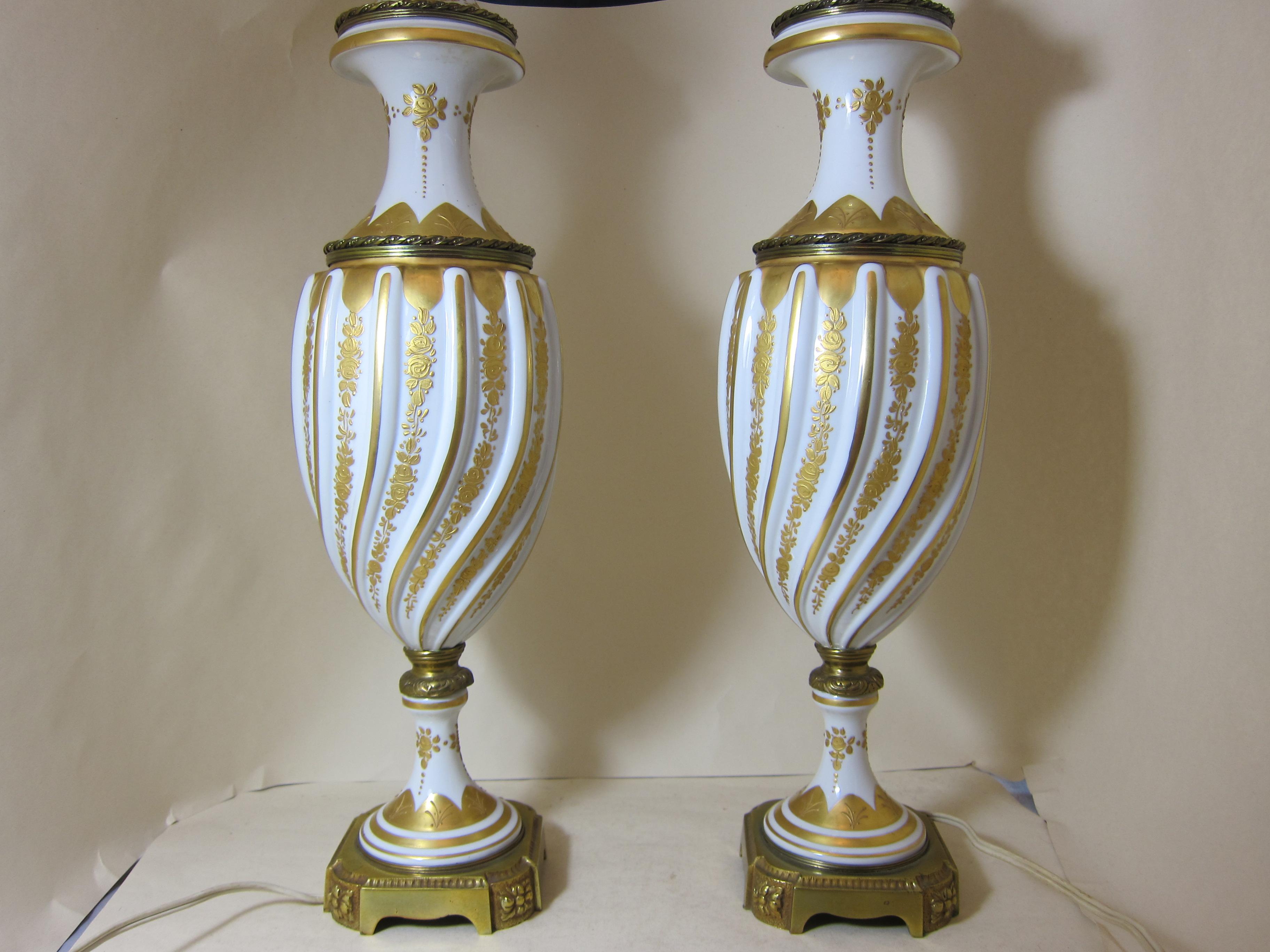 A French porcelain and gilt mounted fluted handpainted gilt decorated 20