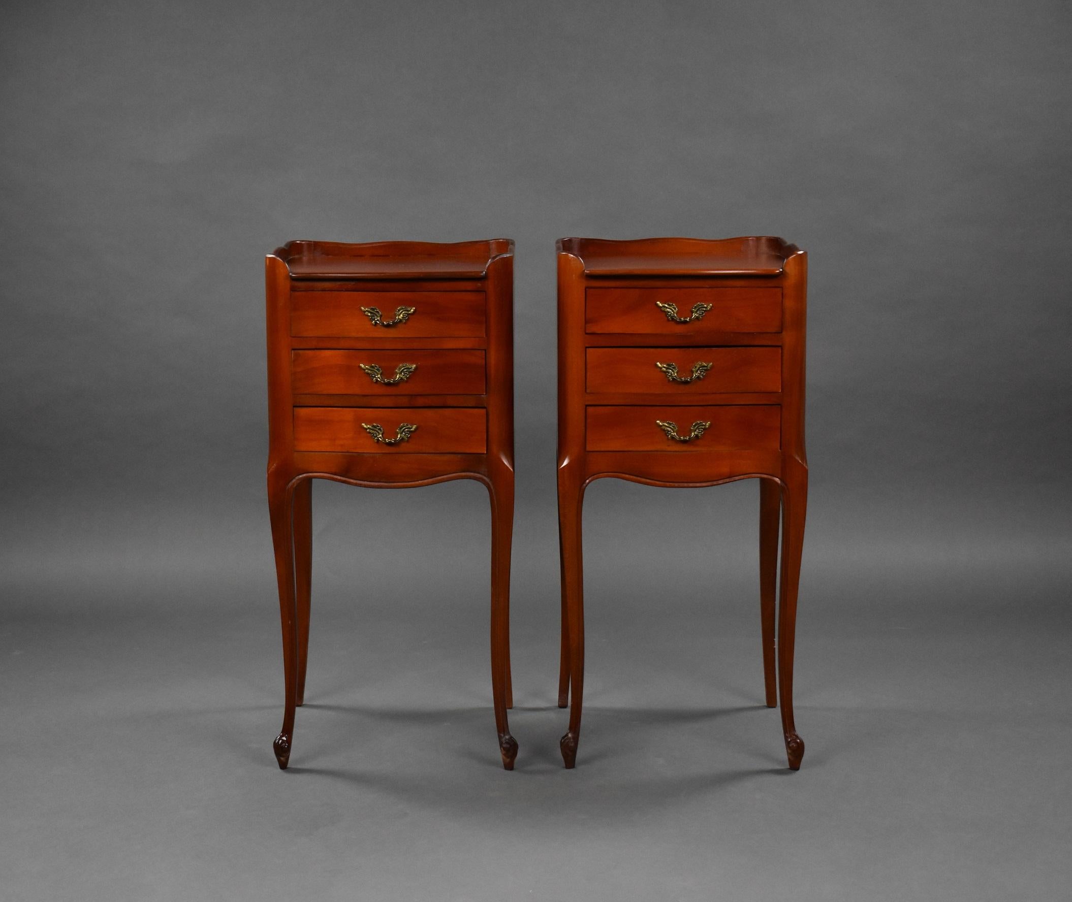 Pair French style walnut bedsides in good condition with three drawers standing on elegant tapered legs.
