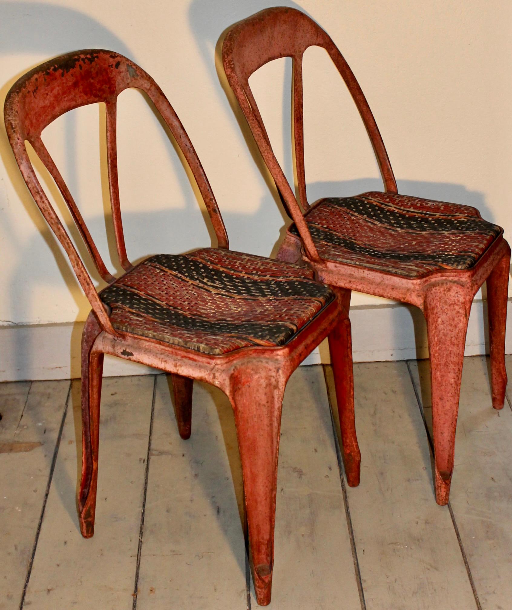 Pair of stacking cafe chairs, all original. Designed by Xavier Pauchard and Joseph Mathieu.  According to: 