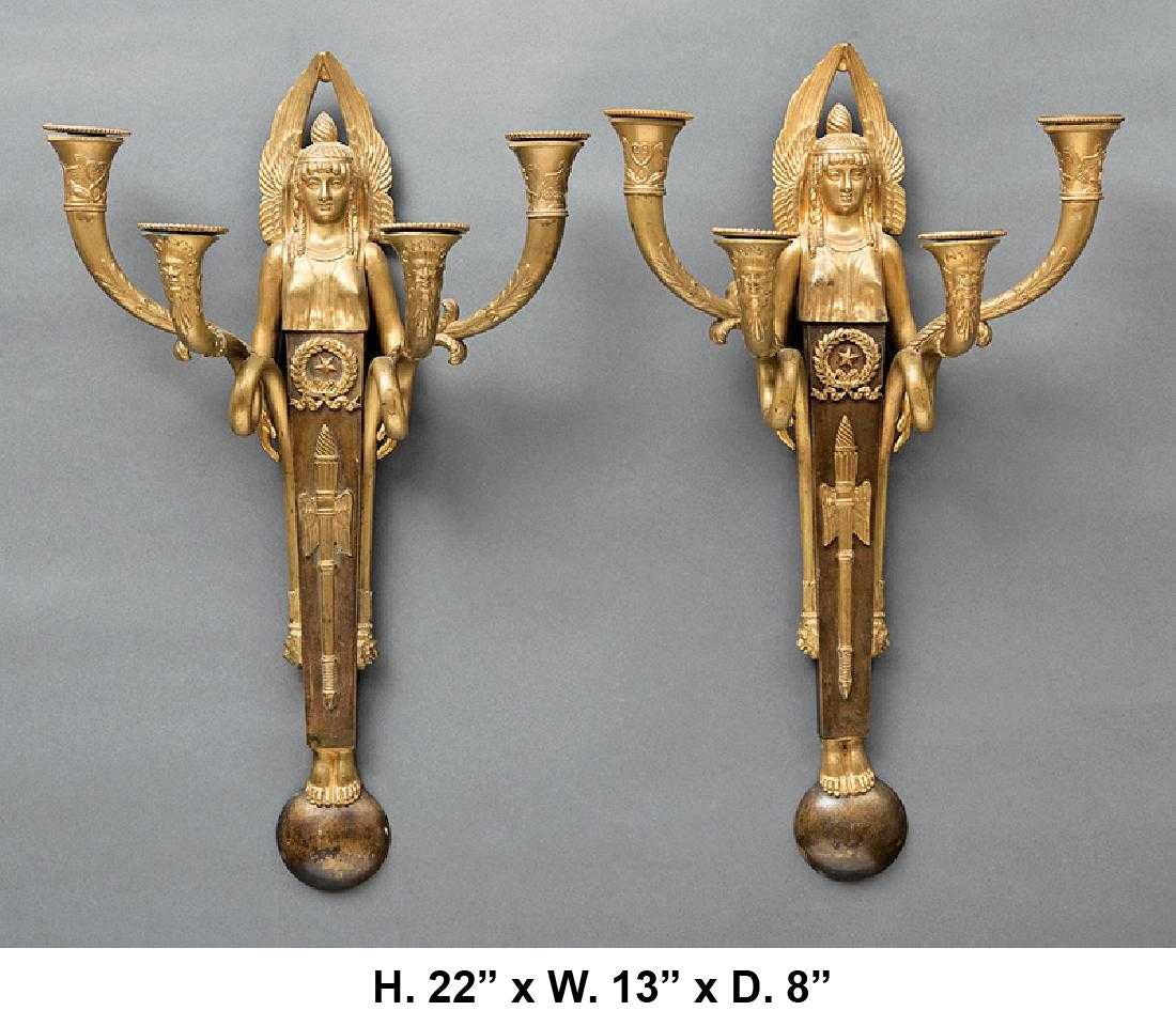 Exuberant pair of French Third Empire ormolu gilt bronze sconces, embellished with winged Victories signed by a French Sculpture named Alexandre Vibert (1847 to 1909)

The fine gilt bronze bust of a Victory rests on a tapered bronze panel with