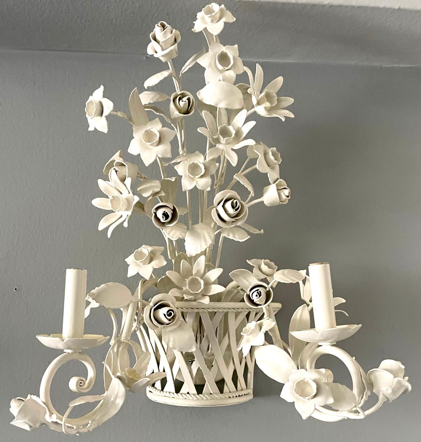 Pair French tole basket sconces with flowers. Pair vintage white painted tole and metal basket sconces issuing varied profusion of blooms and double arm candlestick. France, Mid-20th century
Dimensions: sconce 1: 16