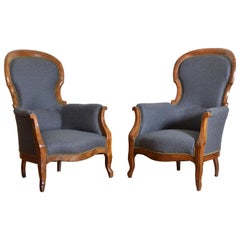 Pair of French Walnut Napoleon III Upholstered Bergères, circa 1860