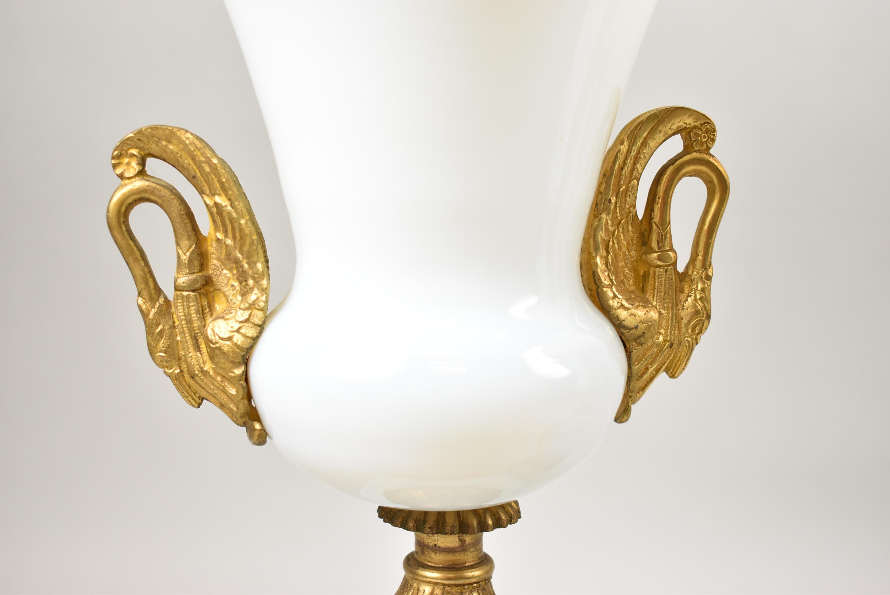 Pair of French white opaline glass Campana shape vases with bronze swan mounted handles.