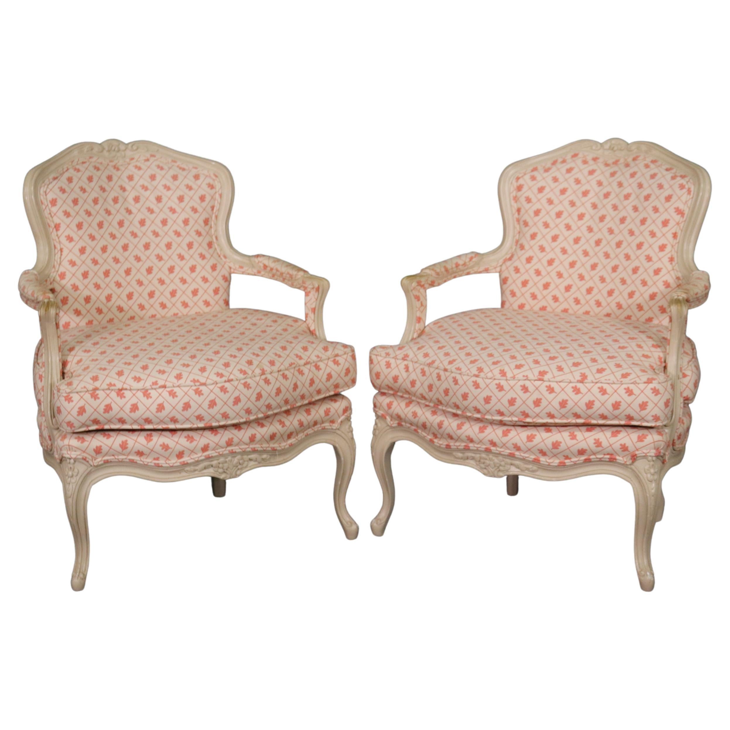 Pair French White Paint Decorated Carved Louis XV Bergere Armchairs Circa 1940s For Sale