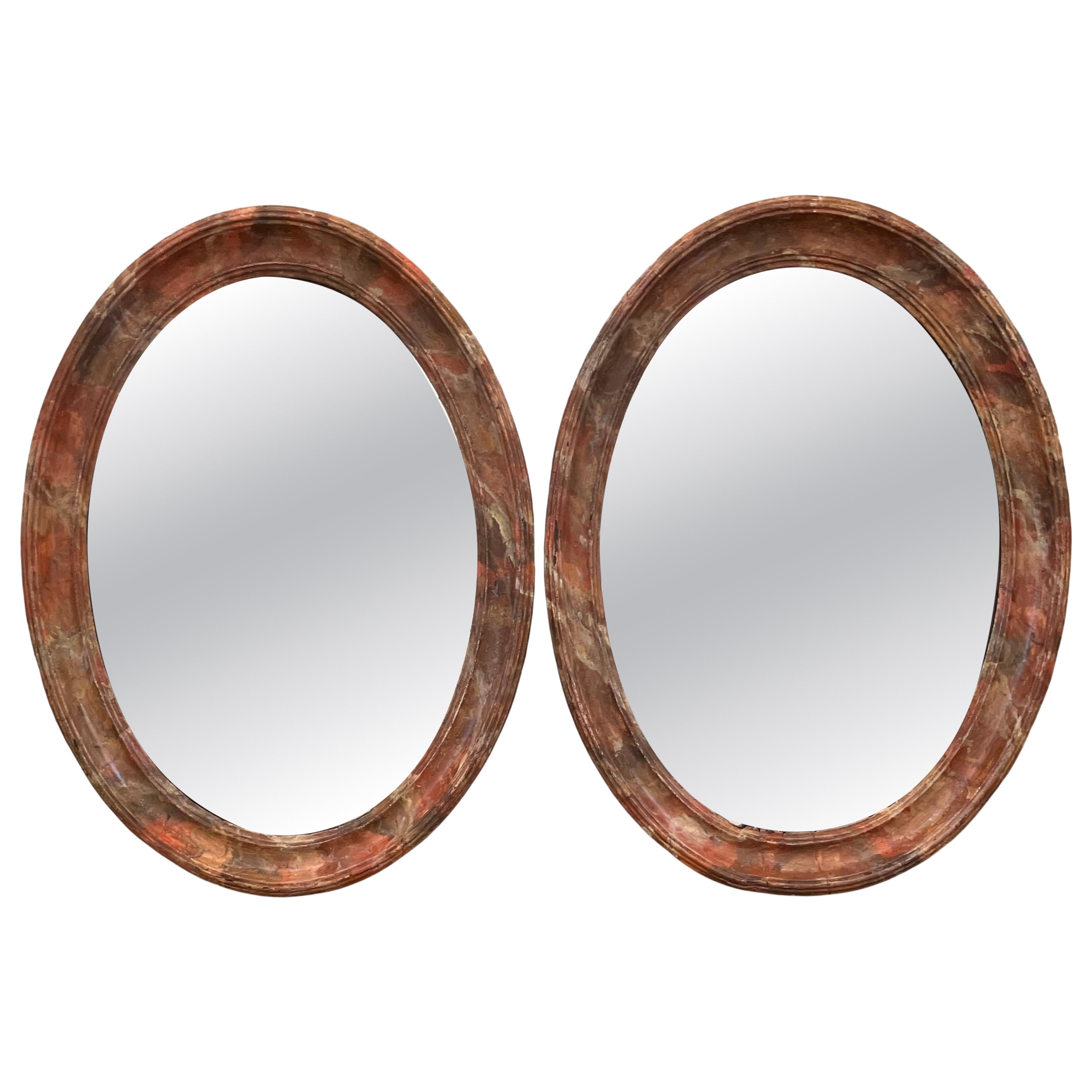 Pair French Wood Carved Oval Faux Marble Mirrors