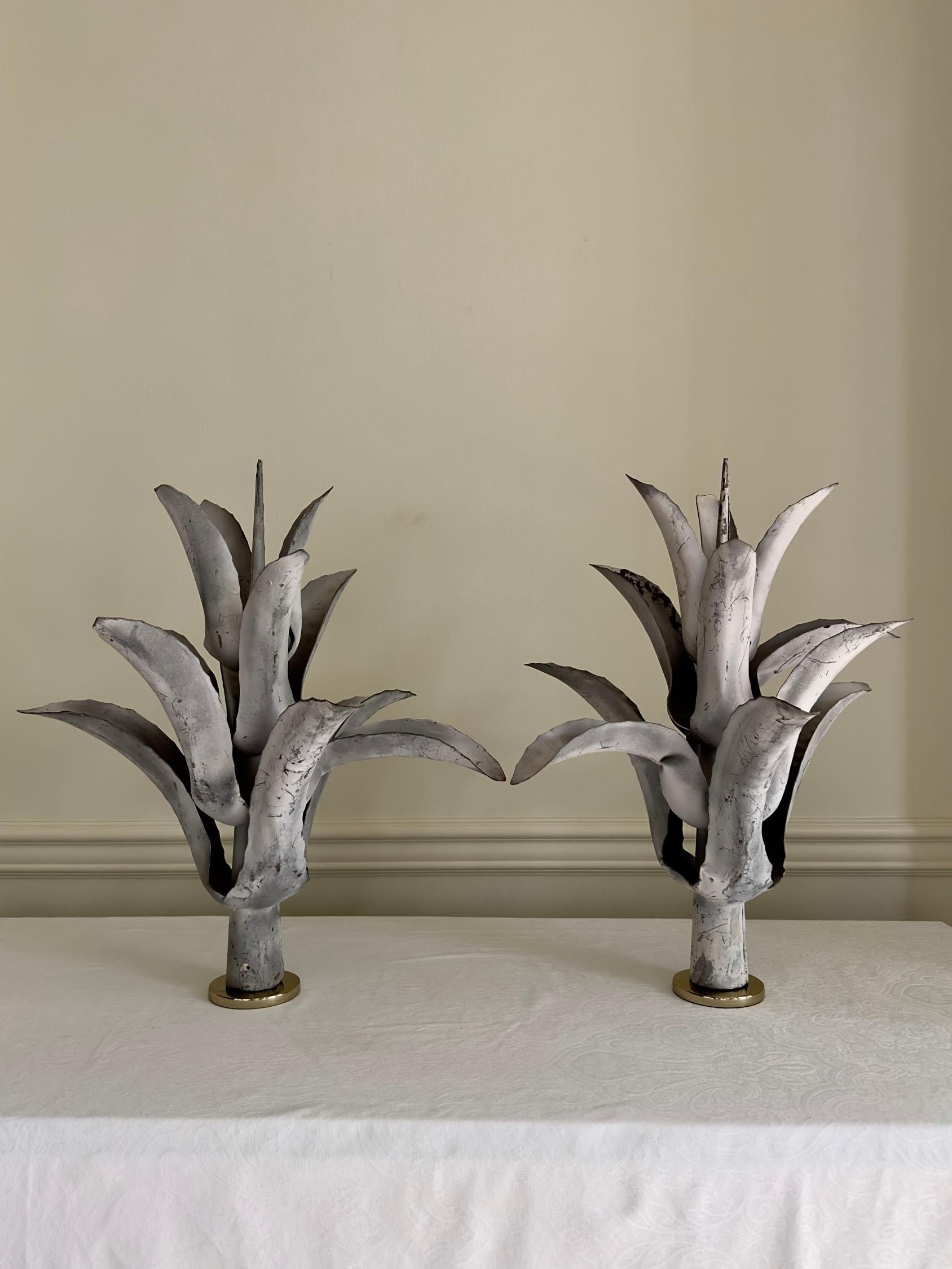Mid-century French zinc sculptures on removable stands. Could be displayed inside or out. Incredibly chic on top of a large armoire or console. 
Also charming in an urn or terracotta pot.

In vintage condition with lovely patina and wear consistent