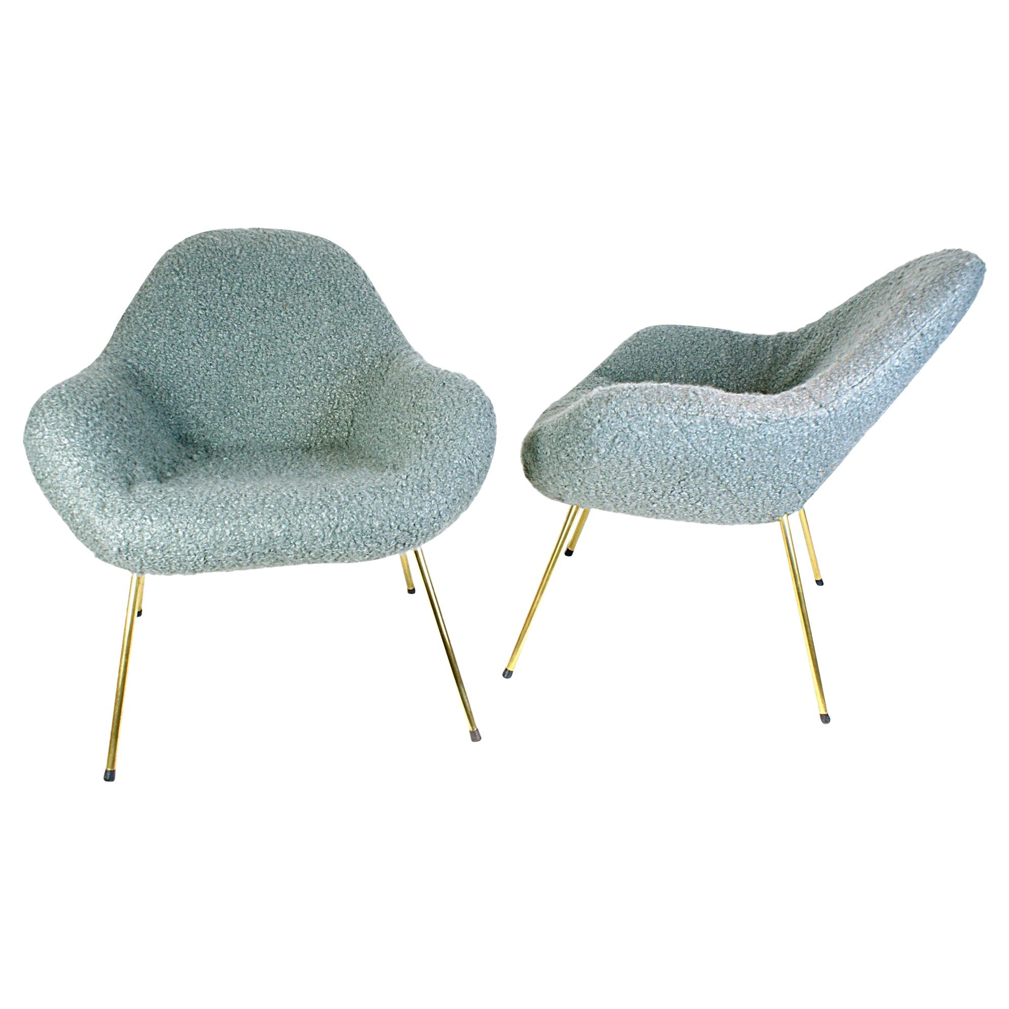 Timeless 1960s ball lounge chairs, designed by Fritz Neth. The chairs have been freshly restored by our upholstery. New foam and high-quality sheep wool mix fabric in light grey, beautifully contrasting with the brass legs. Very good general