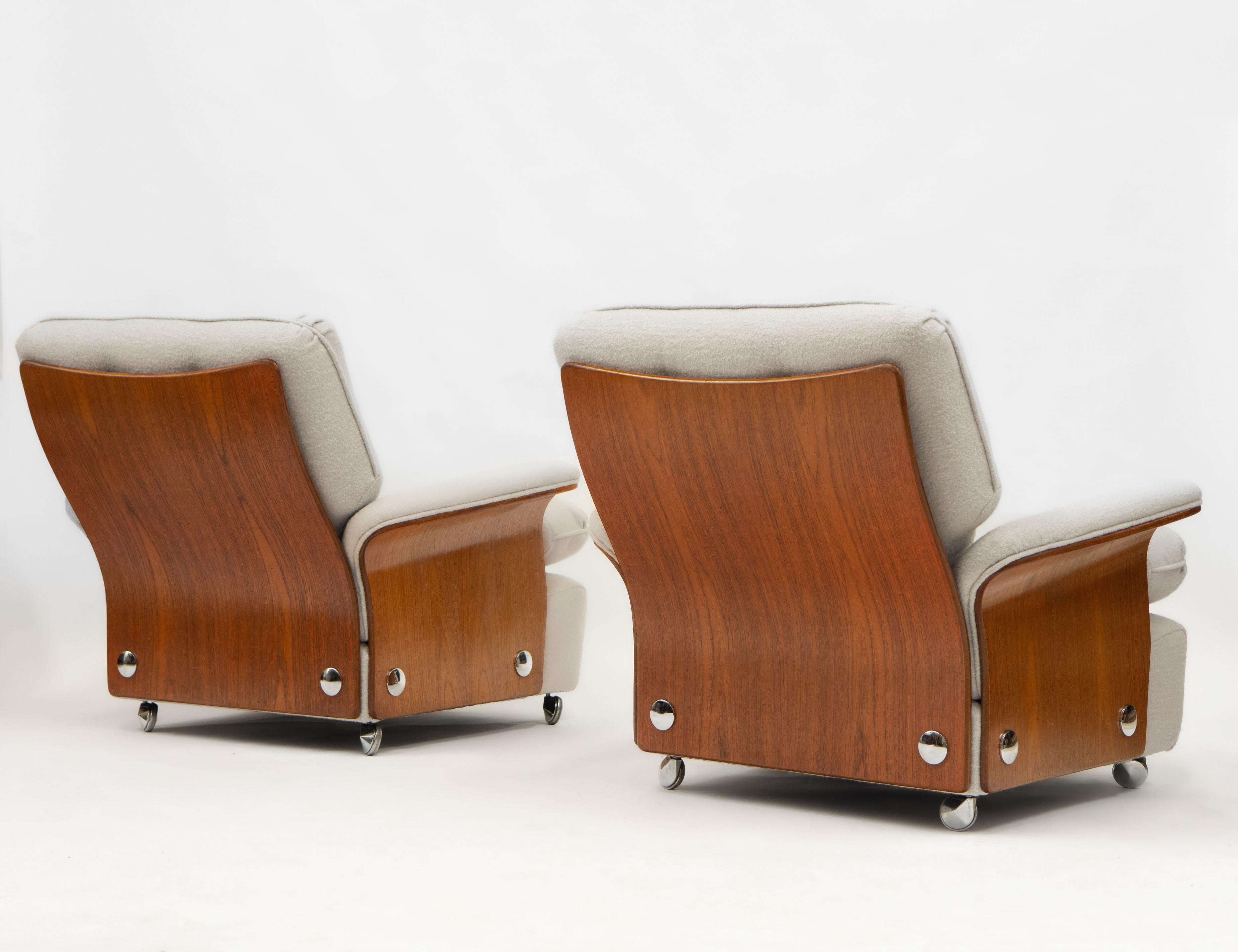 A pair of G-Plan teak ‘Tulip’ lounger armchairs, designed by K.M. Wilkins, reupholstered in bouclé wool. circa 1970.

These superbly comfy loungers are getting harder to source. The chairs show great bent-ply design with contrasting chromed metal