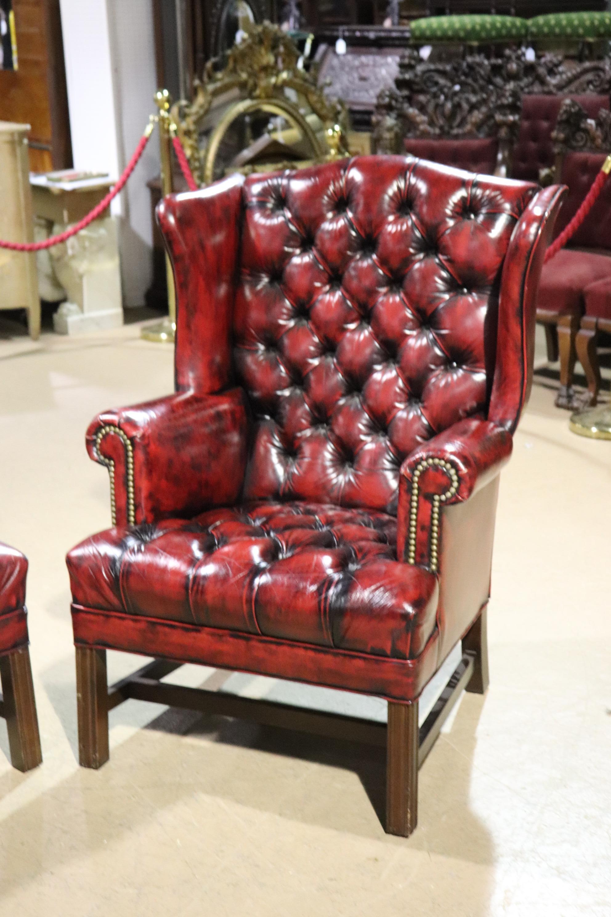 Pair Genuine Leather Oxblood Chesterfield Chippendale Style Mahogany Wing Chairs In Good Condition In Swedesboro, NJ