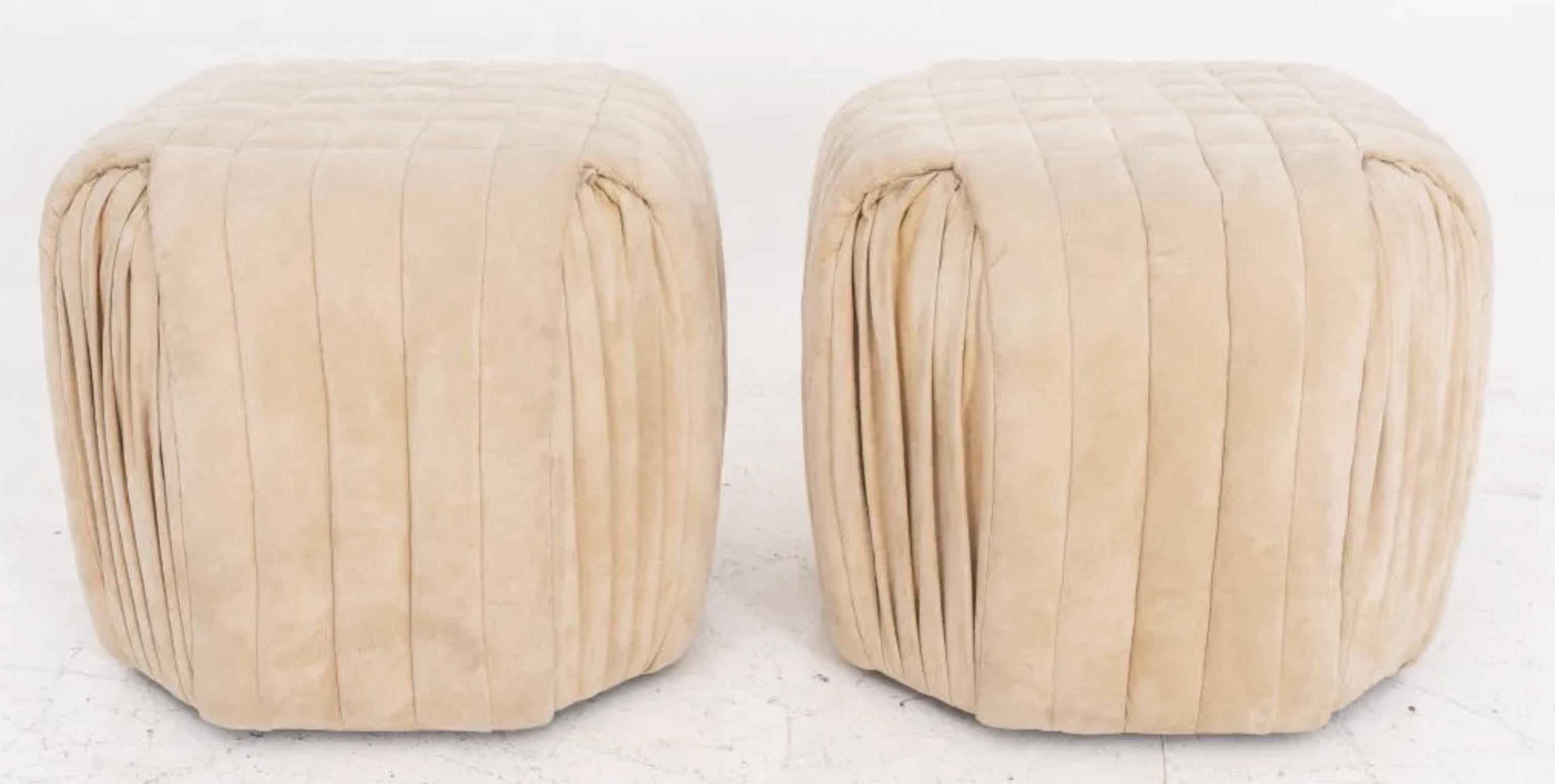 Pair Geometric pleated Mid-Century Modern Beige Suede poufs ottomans or stools. Soft Suede Pleated stools. Great light tan Beige in color. Circa 1970s In the Style of De Sede. No Labels or Marks. Located In Brooklyn NYC.

Sold as a Pair of (2