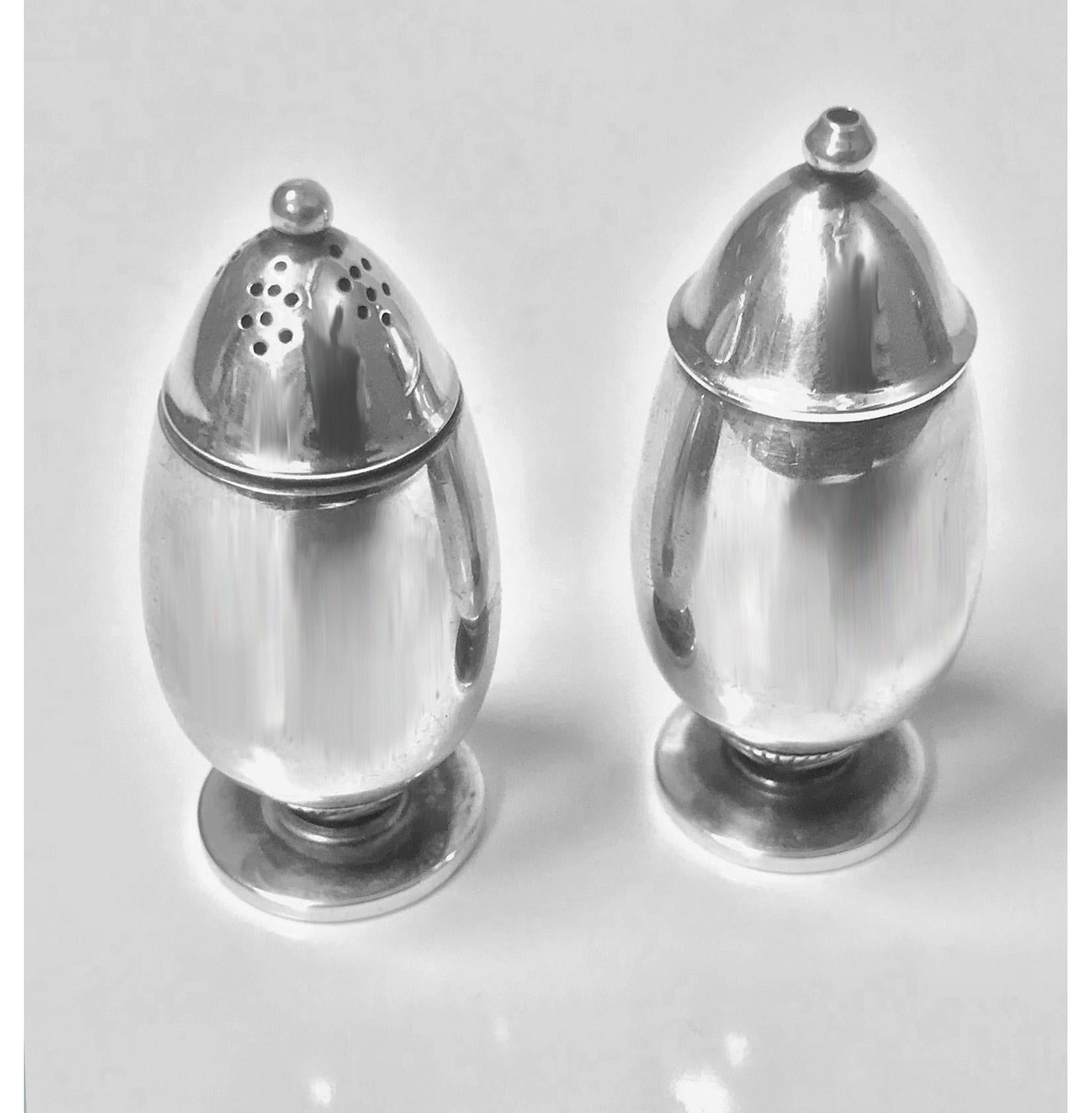 Pair of Georg Jensen silver salt and pepper shakers casters #629B- Cactus/ Kaktus - Gundorph Albertus Designed by: Gundorph Albertus 1887-1970 Casters in the Cactus pattern. Total weight: 42.30 grams. Measures: Heights 2.1 inches, 5.34 cm.