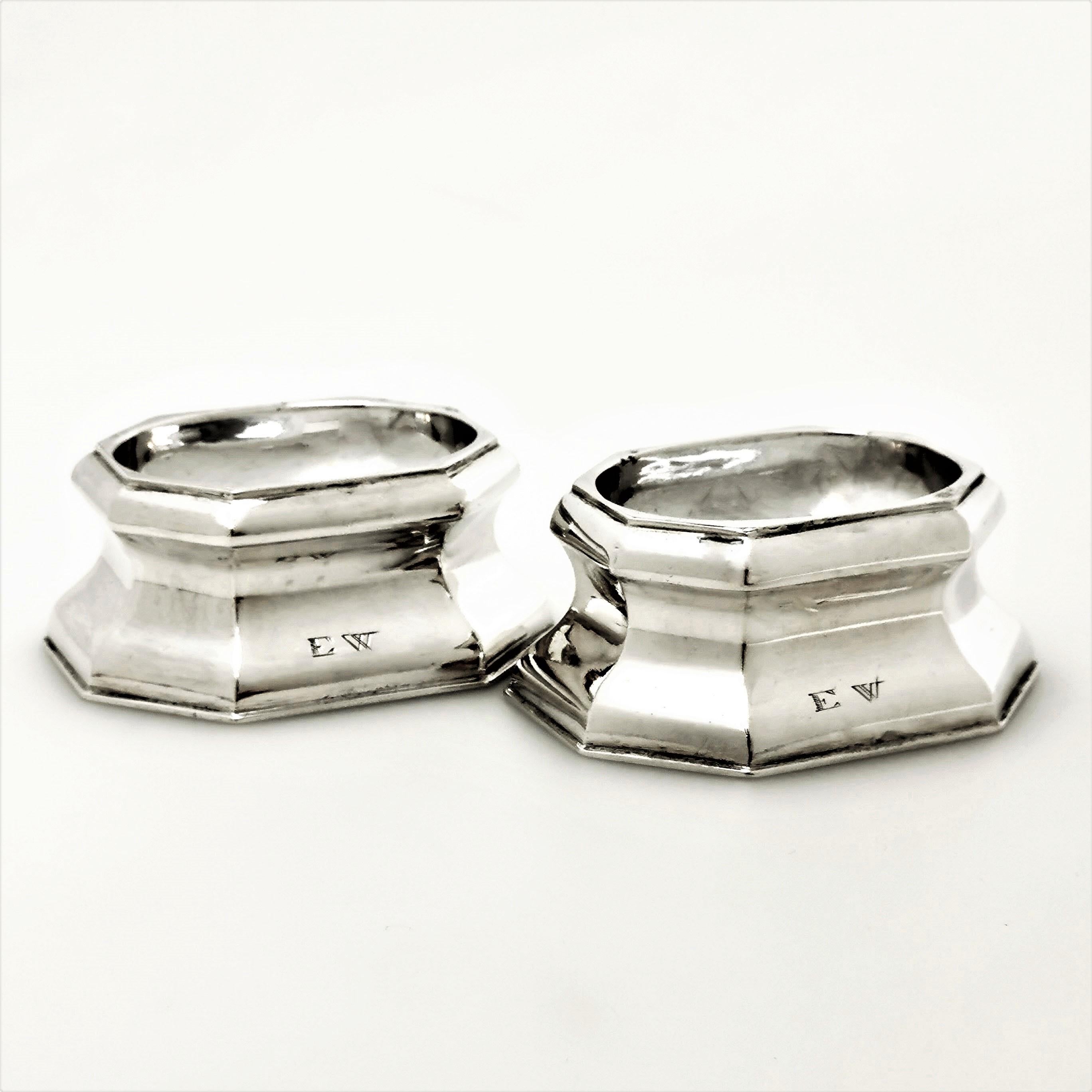 A classic pair of early Georgian Silver Salts. These George II Salts are in a classic elongated octagonal trencher shape, concave in the centre of the side and with an oval sunken well in centre. The Salts are unadorned as is typical of the period