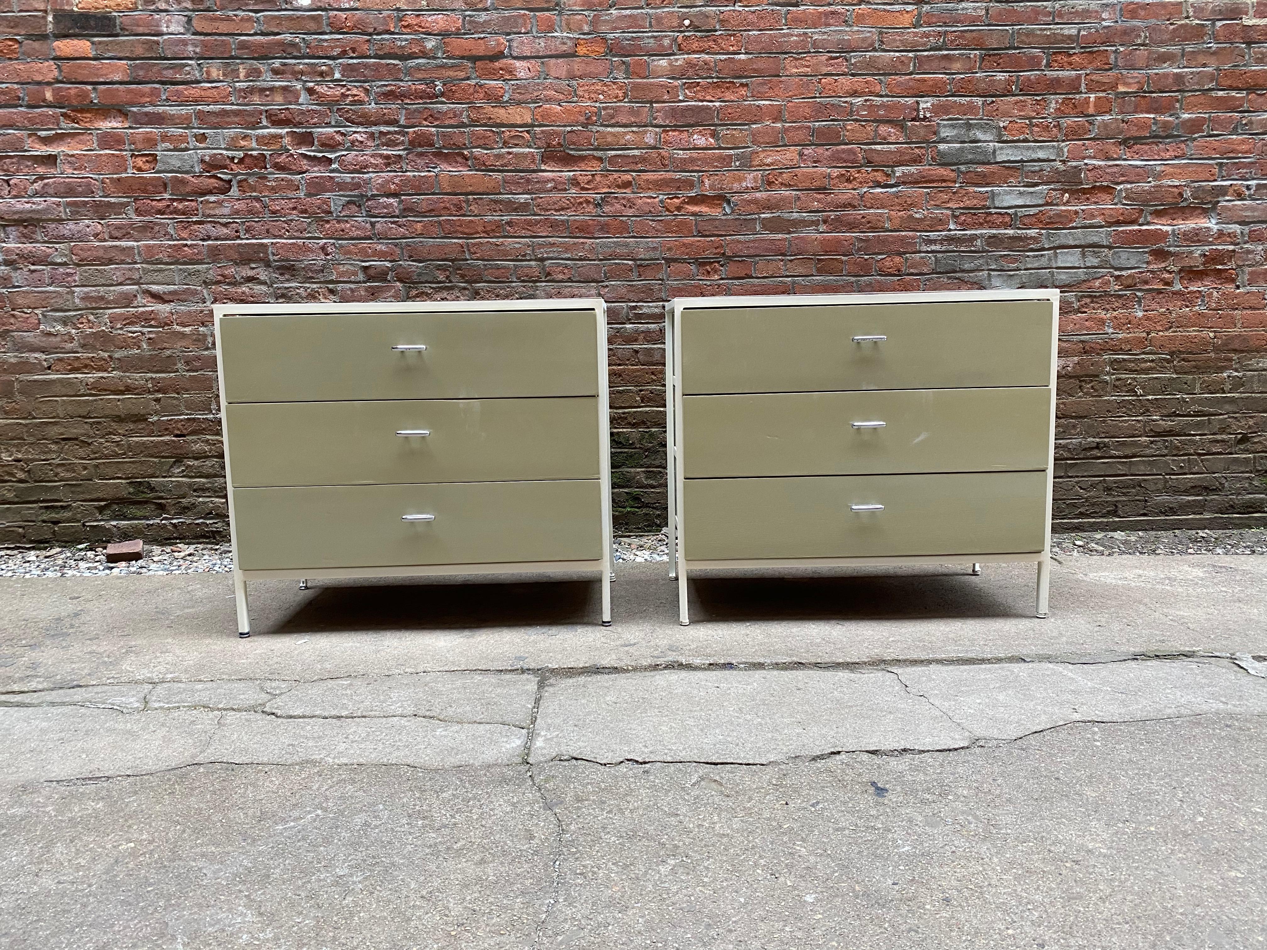 Pair of George Nelson for Herman Miller steel frame and laminate dressers. Three deep drawers with white steel frames and a 