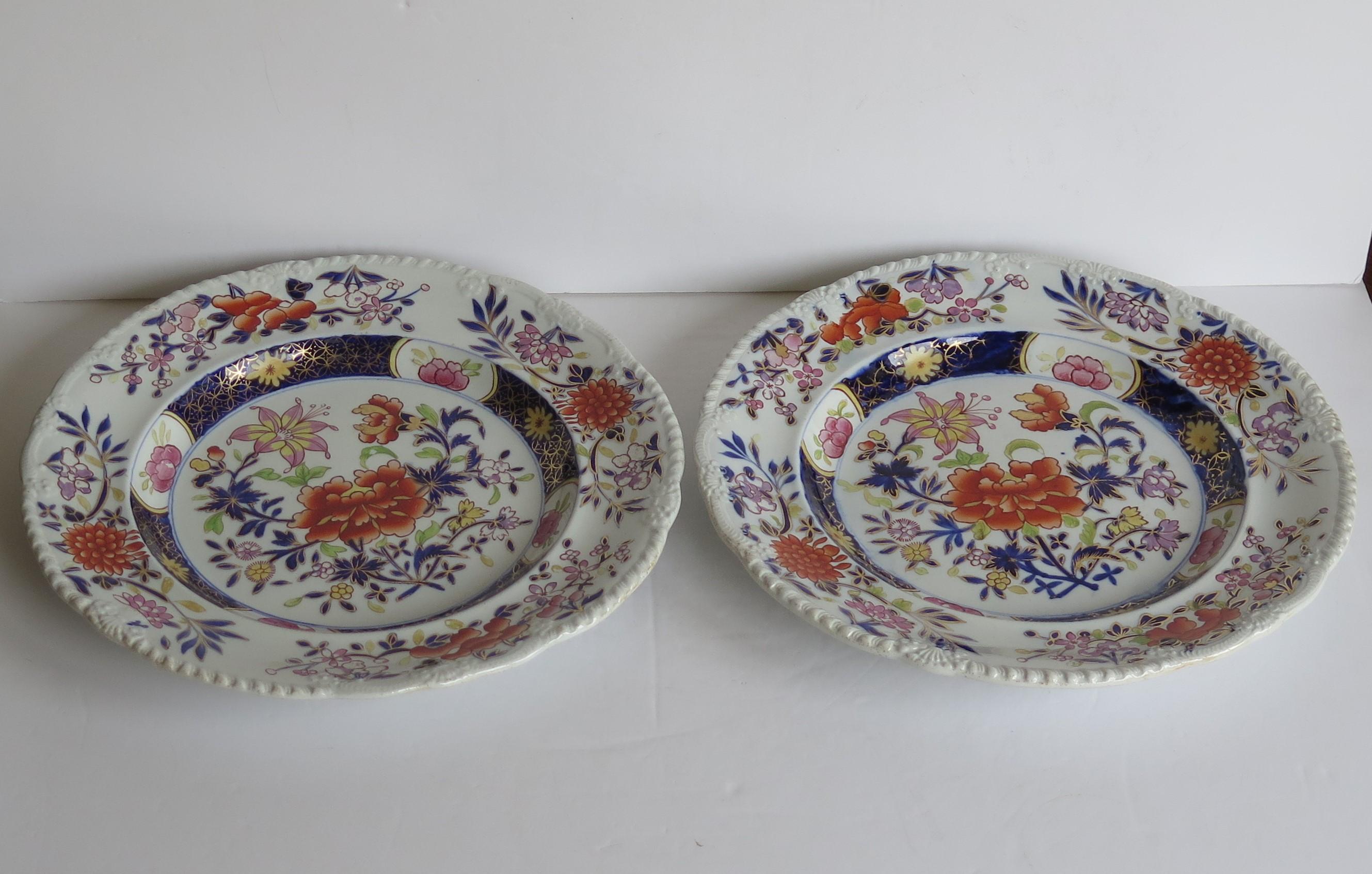This fine pair of Ironstone pottery large dinner plates were made by the Mason's factory at Lane Delph, Staffordshire, England and are decorated in the Heavily Floral Japan pattern, fully stamped and dating to the earliest period of Mason's