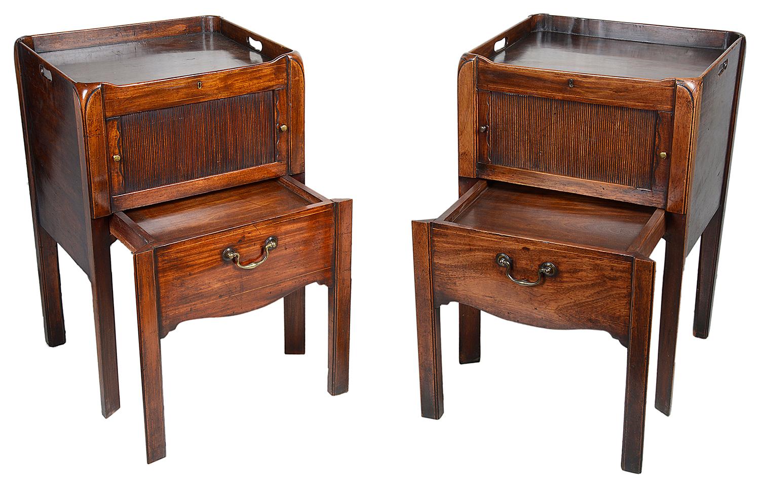 A good quality pair of Georgian period mahogany bedside commodes, each with tray tops, sliding tambour fronted compartments, sliding shelf sections on two legs with swan neck handles.
