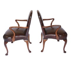 Pair Georgian Revival Walnut & Leather open elbow chairs