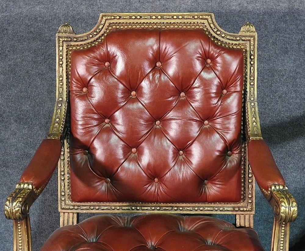 Pair of Gilded Carved Tobacco Brown Leather Tufted Fauteuil Armchairs circa 1920 In Good Condition In Swedesboro, NJ