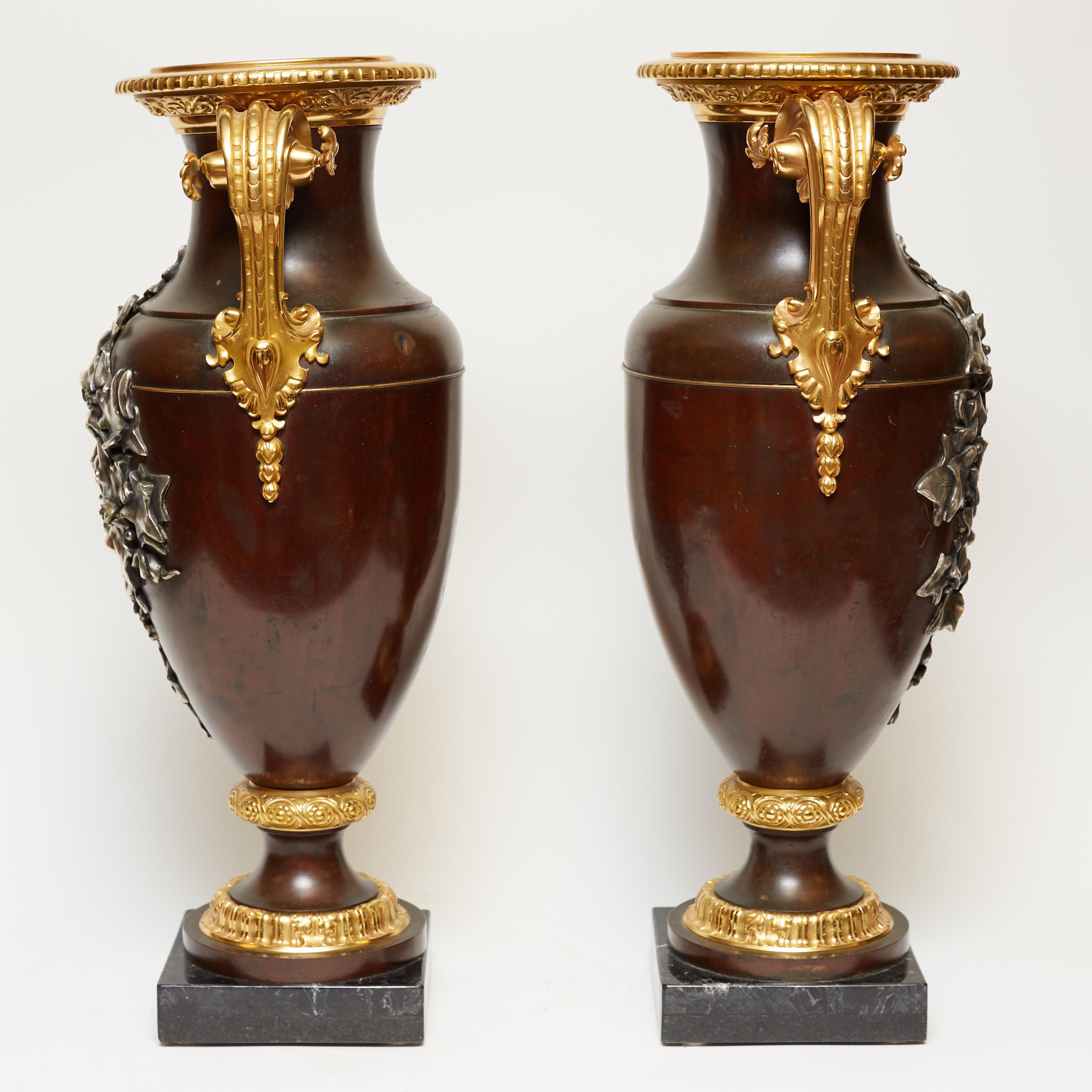 Pair Gilt and Patinated Bronze  Vases with Bacchanalian Silvered Masks 1