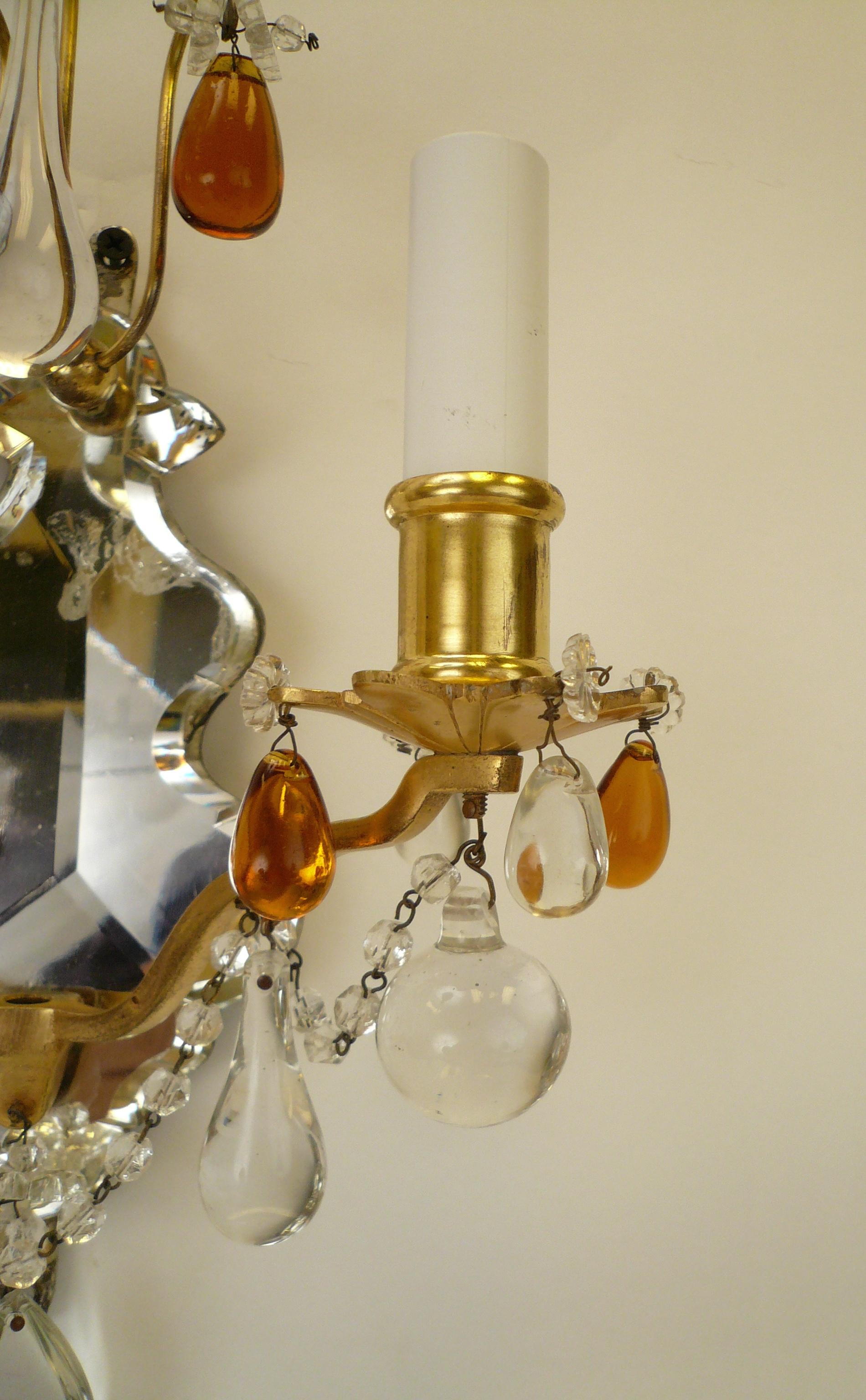 20th Century Pair of Gilt Bronze and Mirror Back Sconces with Clear and Amber Crystal Prisms