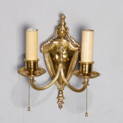 Pair of Gilt Bronze Neoclassical Shield Wall Sconces with Urns and Flame Finial