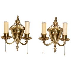 Pair of Gilt Bronze Neoclassical Shield Wall Sconces with Urns and Flame Finial