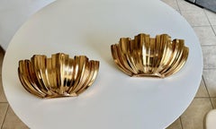 Pareja de apliques de concha de bronce dorado by Boyd